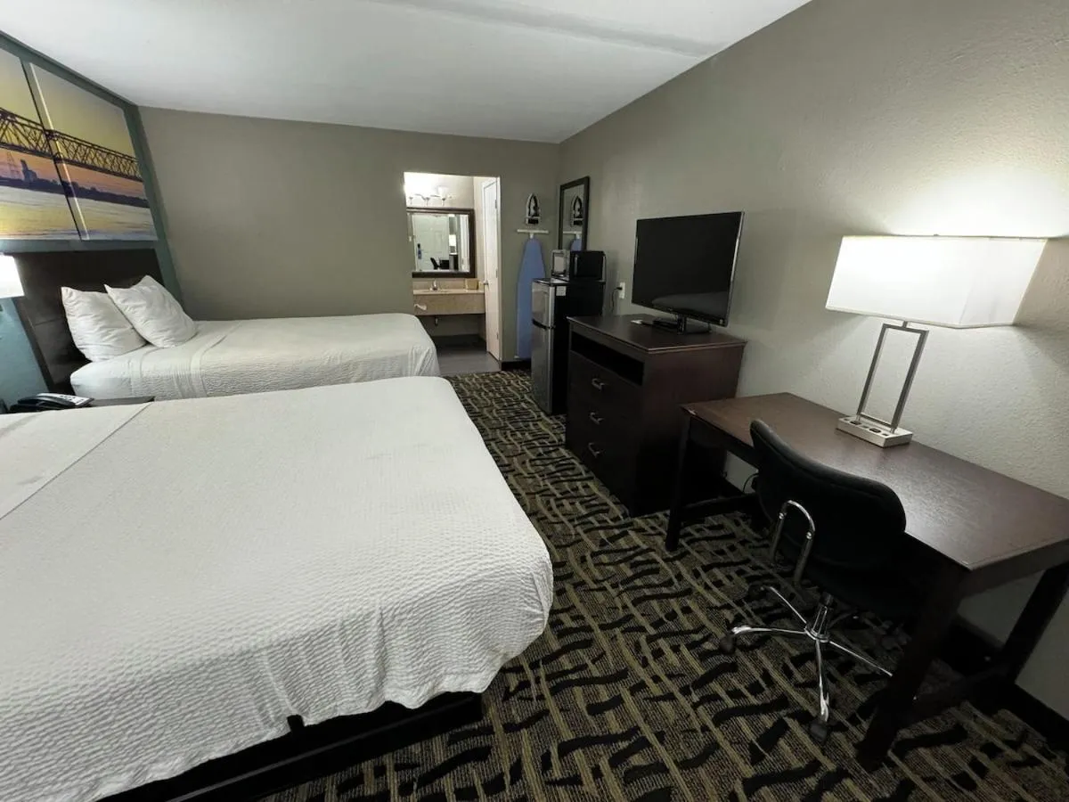 Bed in Homegate Inn And Suites