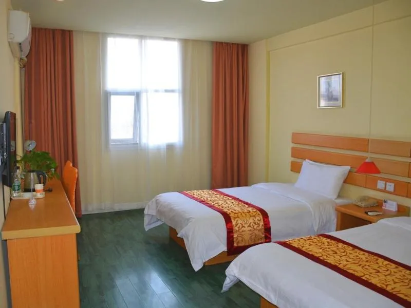 Bed in Shell Xinyu City Railway Station Plaza Hotel