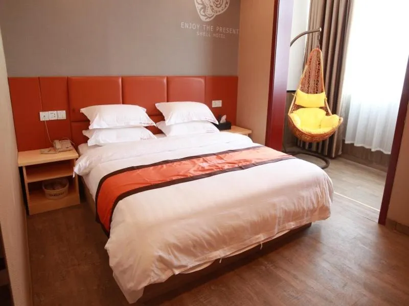 Bed in Shell Xinyang Huangchuan County Railway Station Hotel
