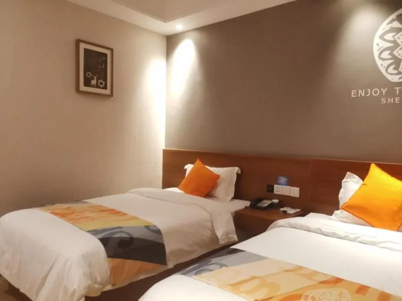 Bed in Shell Liaocheng Linqing City Bus Station Hotel