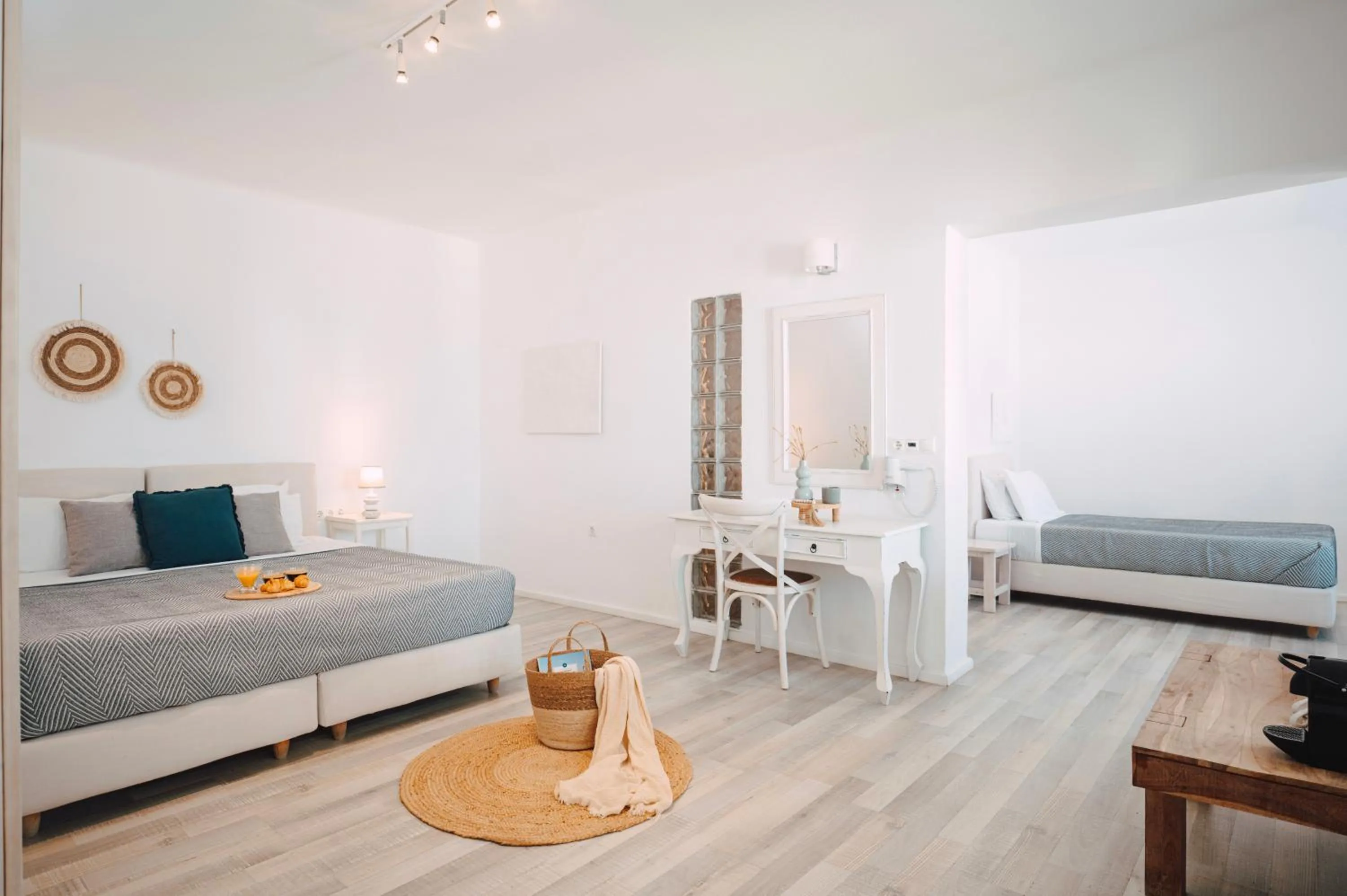 Bed in With-inn Mykonos Suites