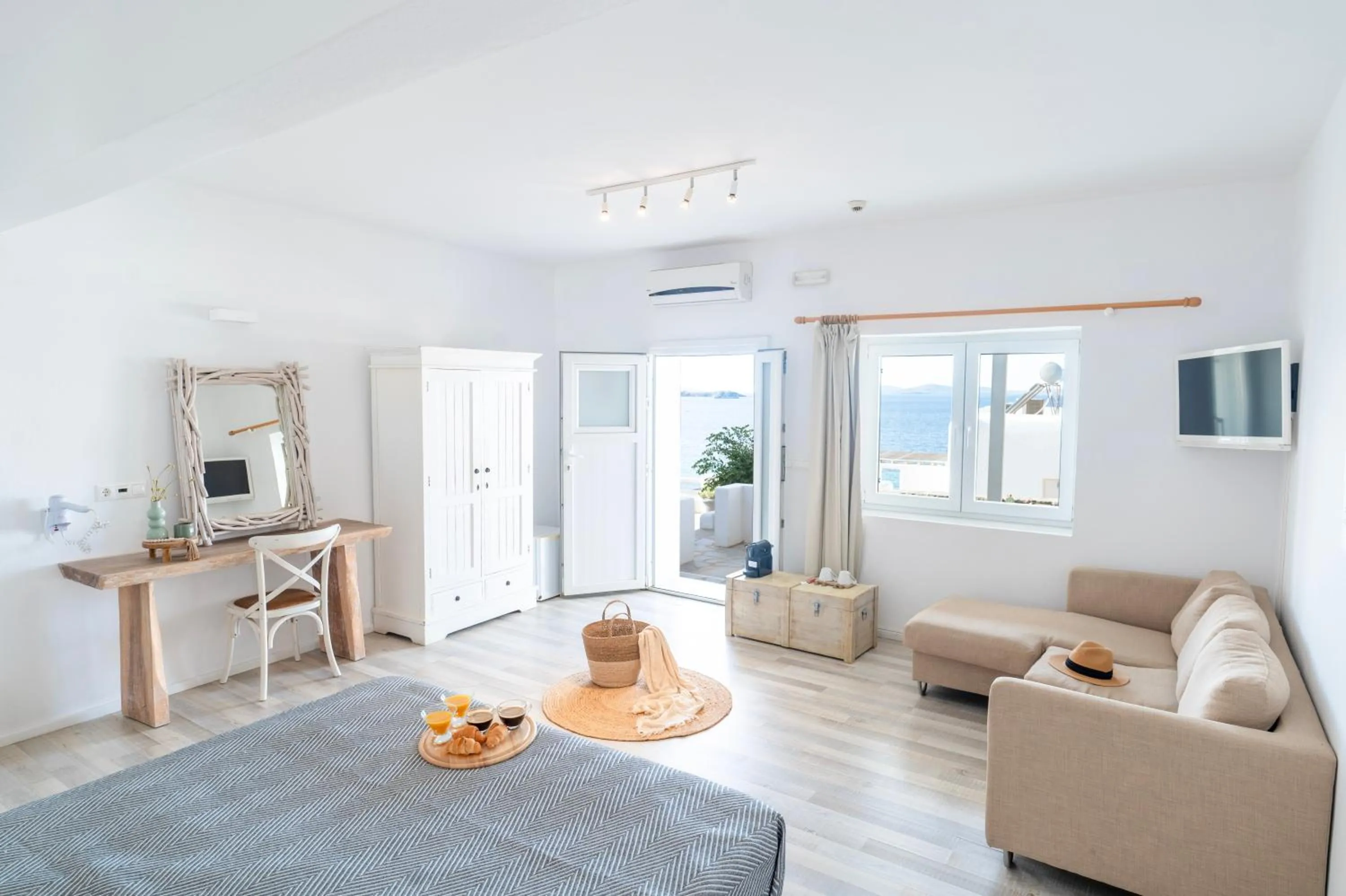 Bed in With-inn Mykonos Suites