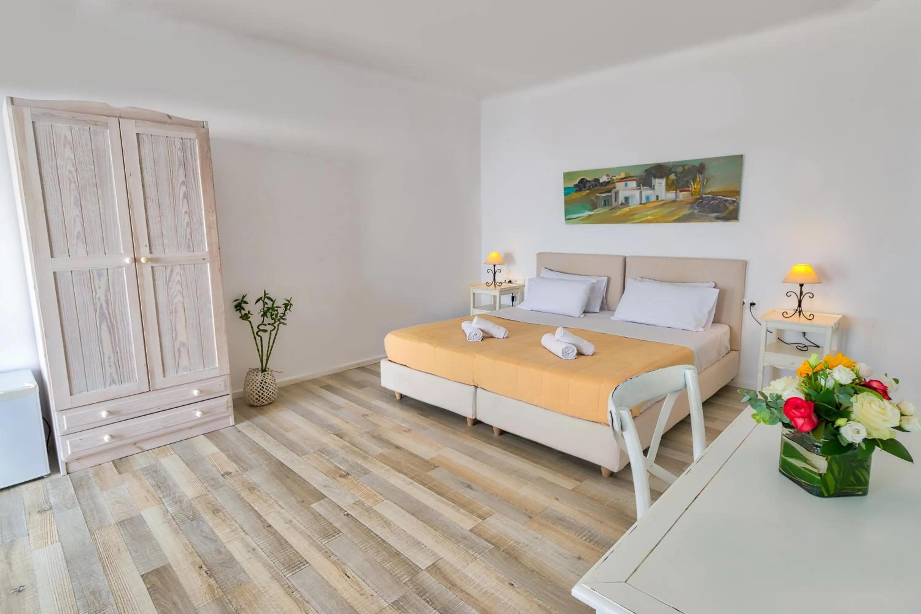 Bed in With-inn Mykonos Suites