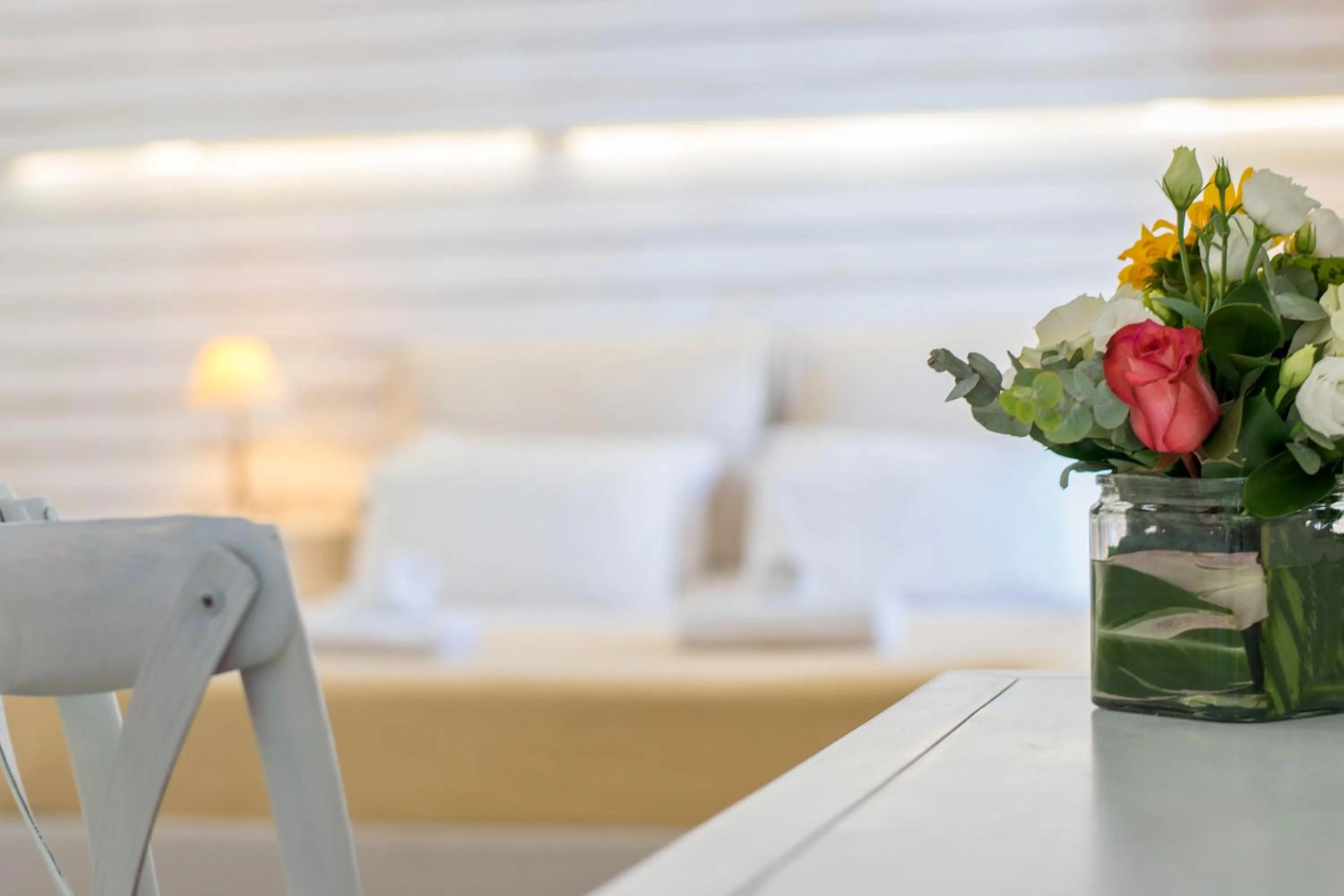 Bed in With-inn Mykonos Suites