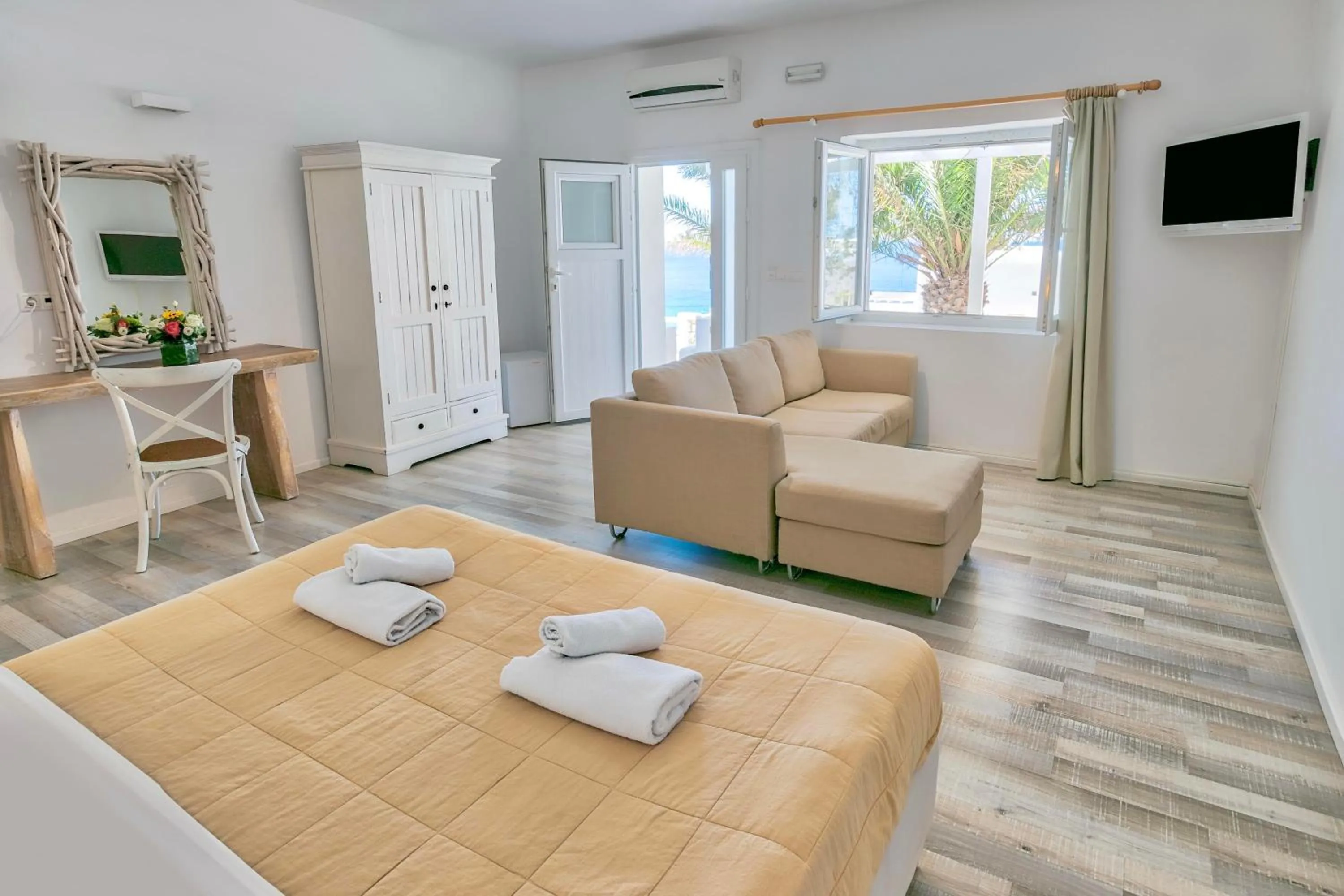 Bed in With-inn Mykonos Suites