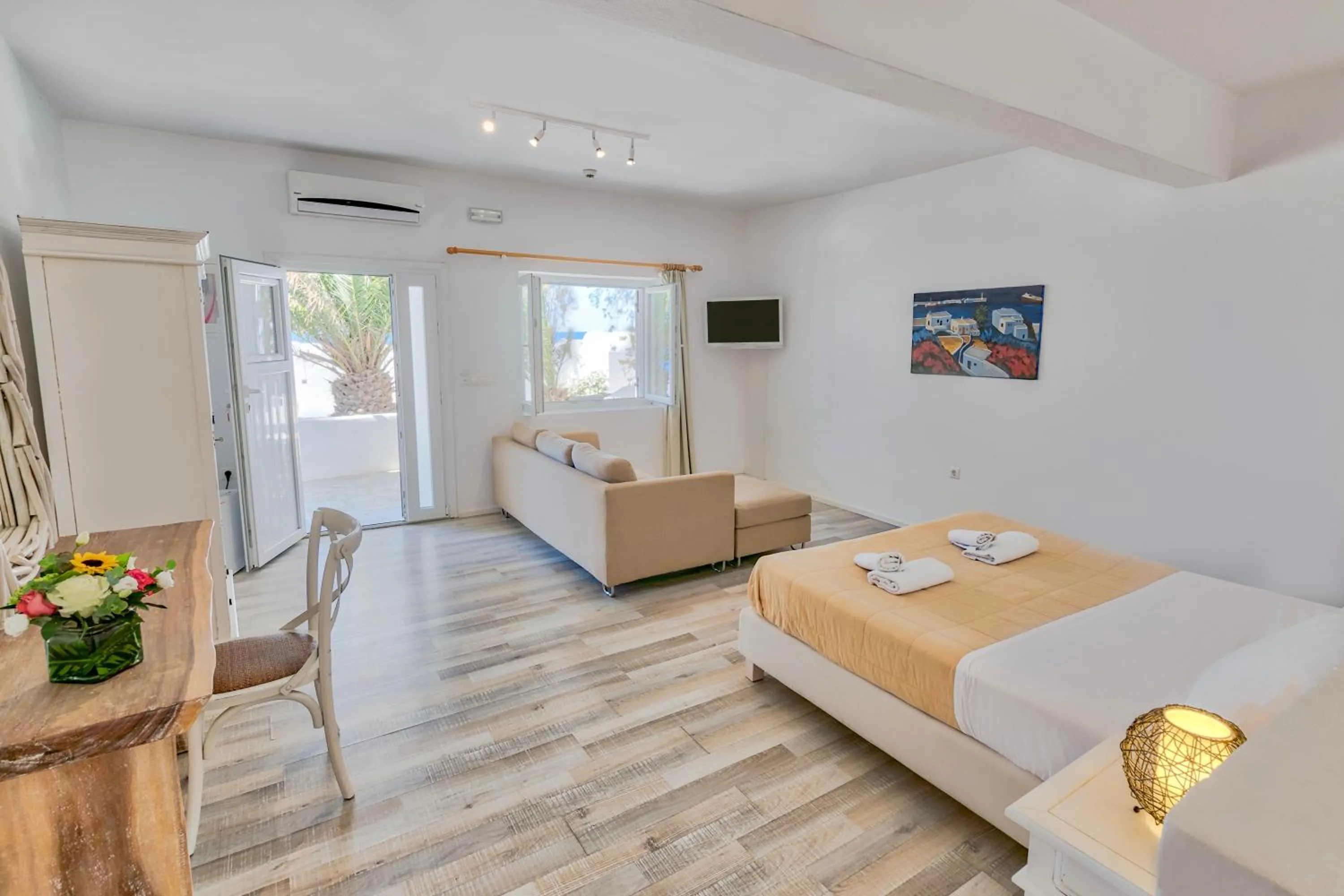 Bed in With-inn Mykonos Suites
