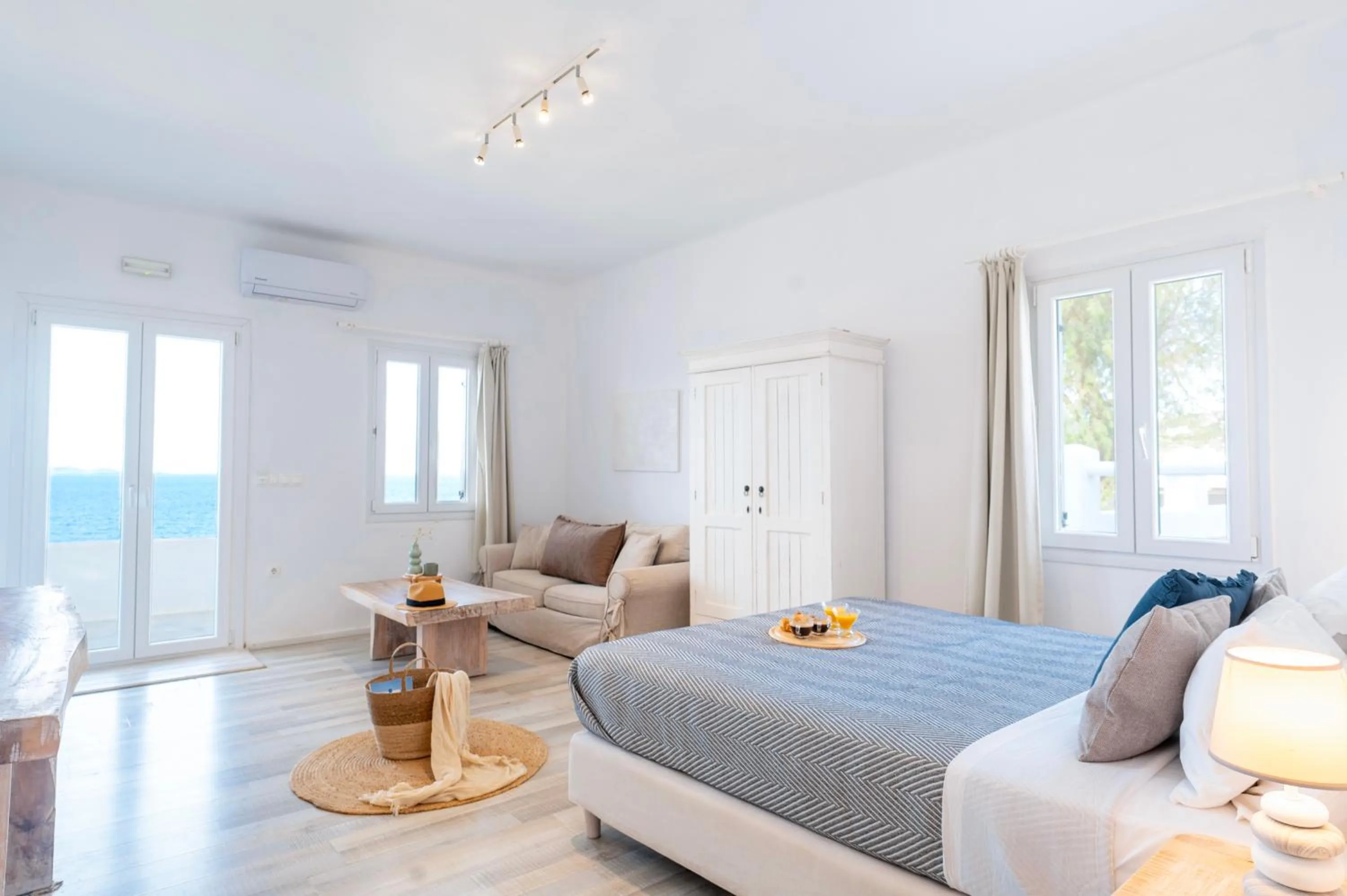 Bed in With-inn Mykonos Suites