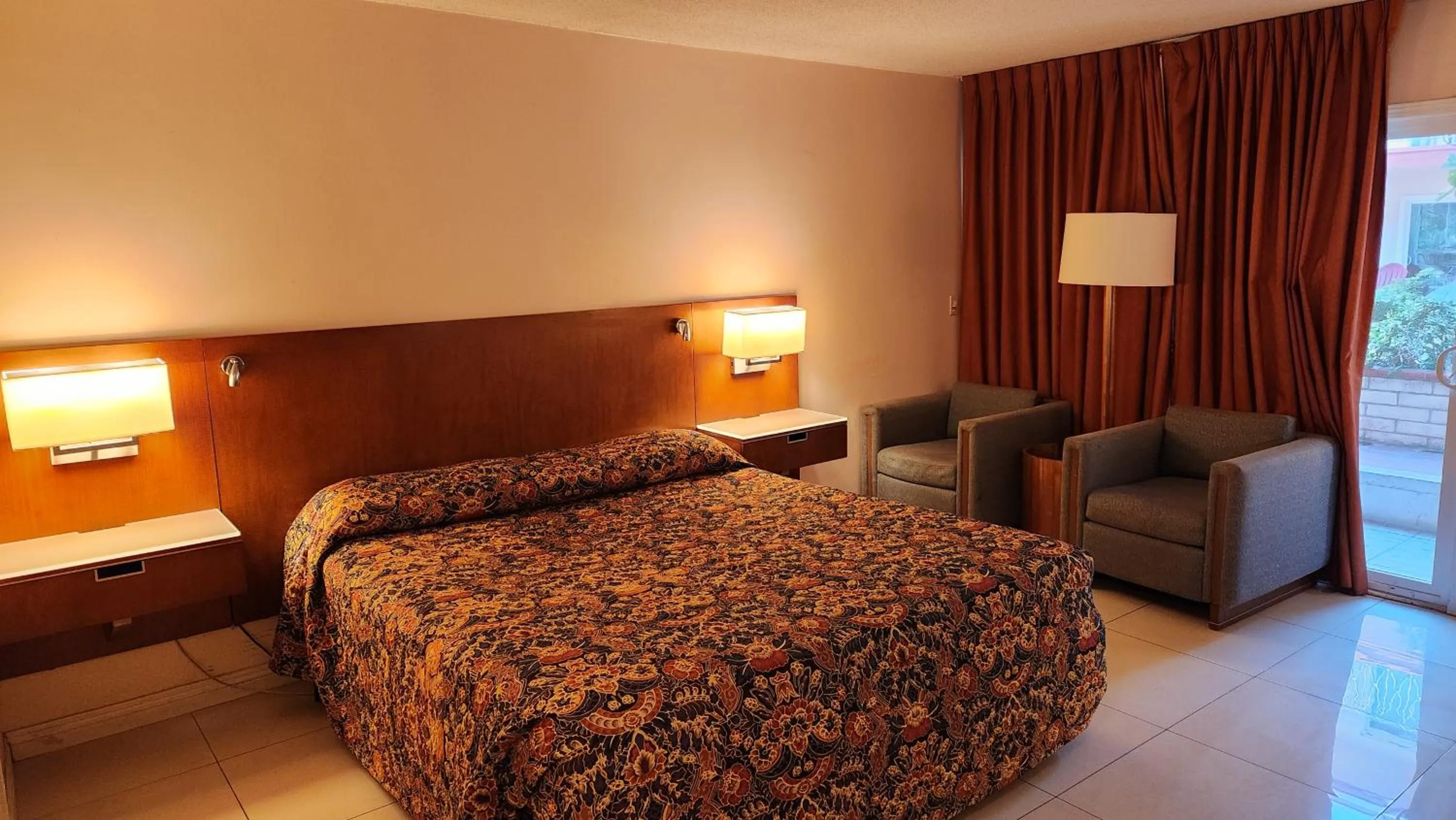 Bed in Royal Century Hotel at LAX