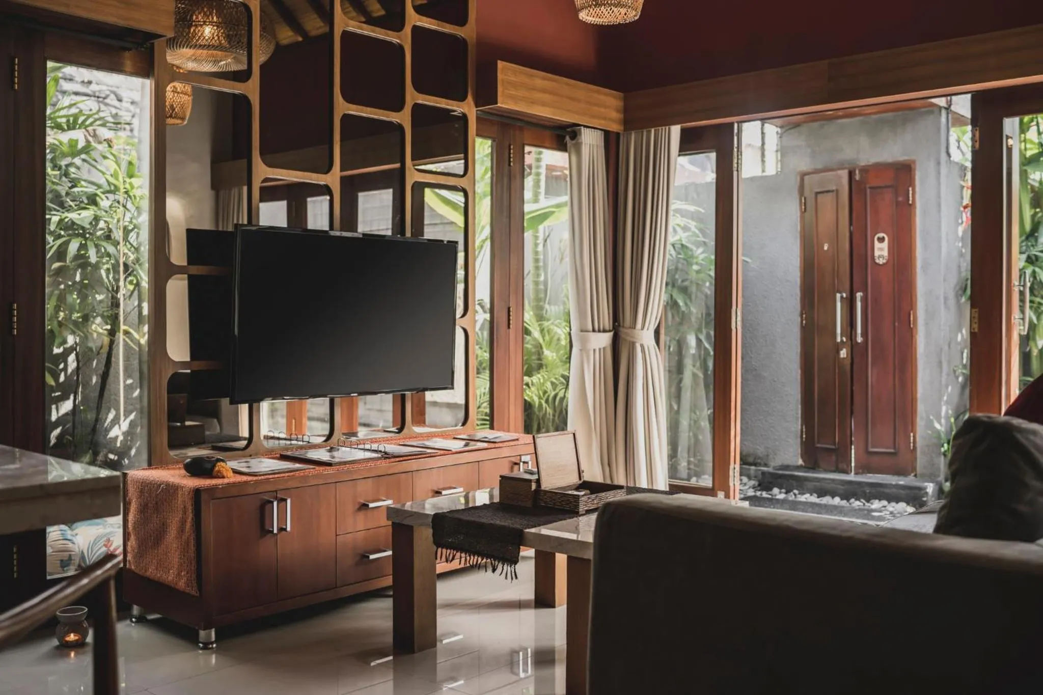 Living room in Seminyak Sanctuary Villa by Ini Vie Hospitality