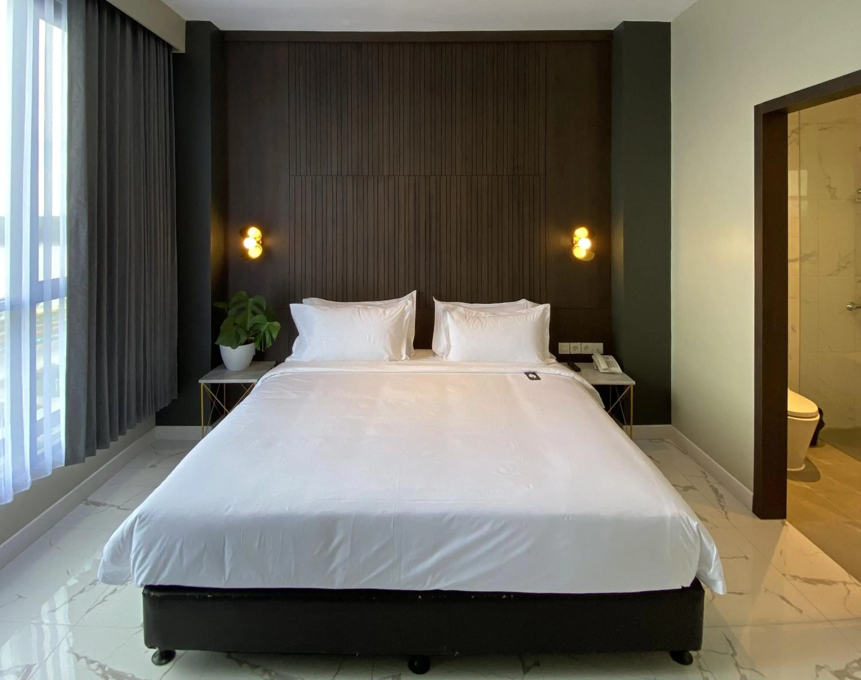 Bedroom, Bed in Luminor Hotel Tanjung Selor By WH