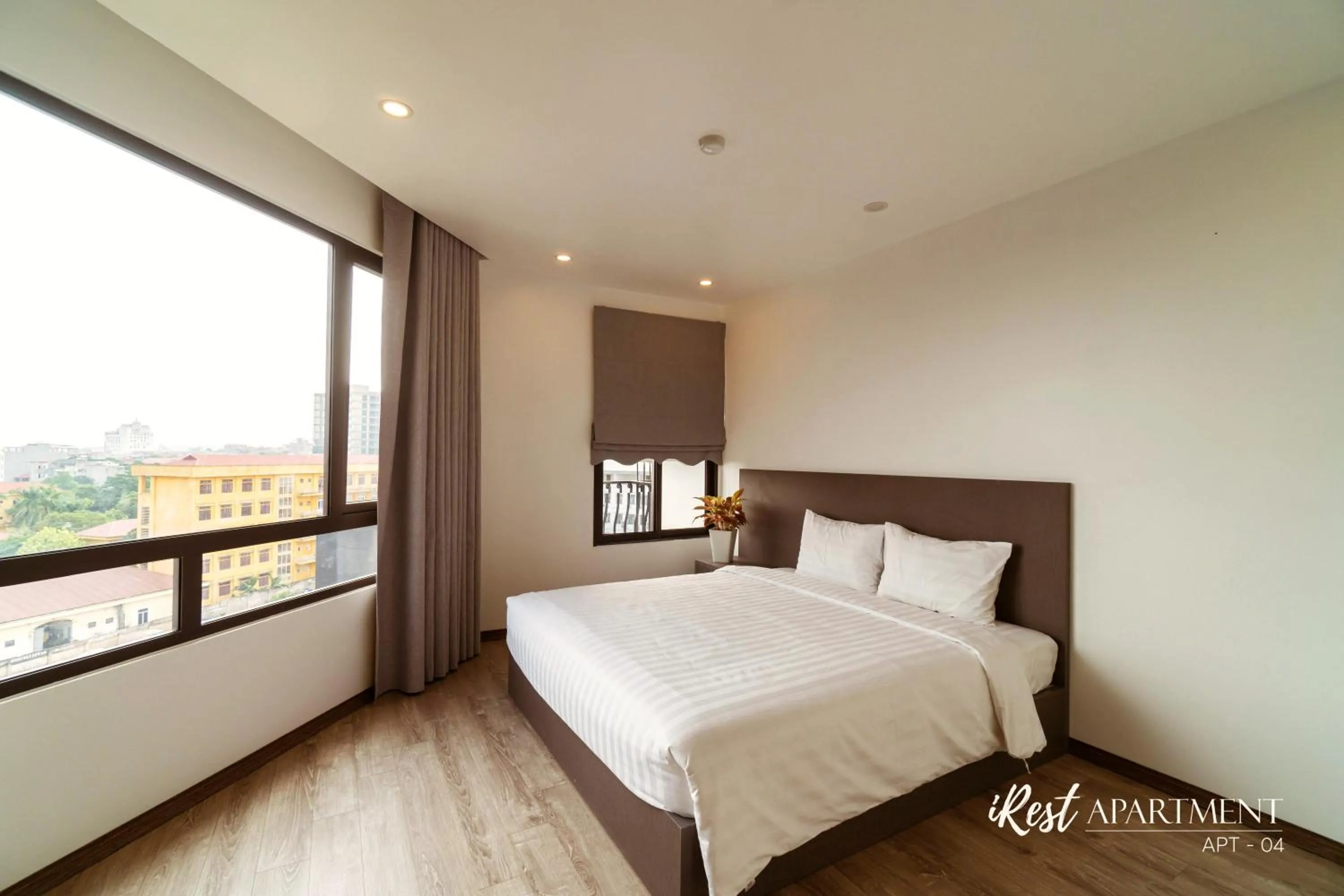 Bed in iRest Apartment Vinh Yen