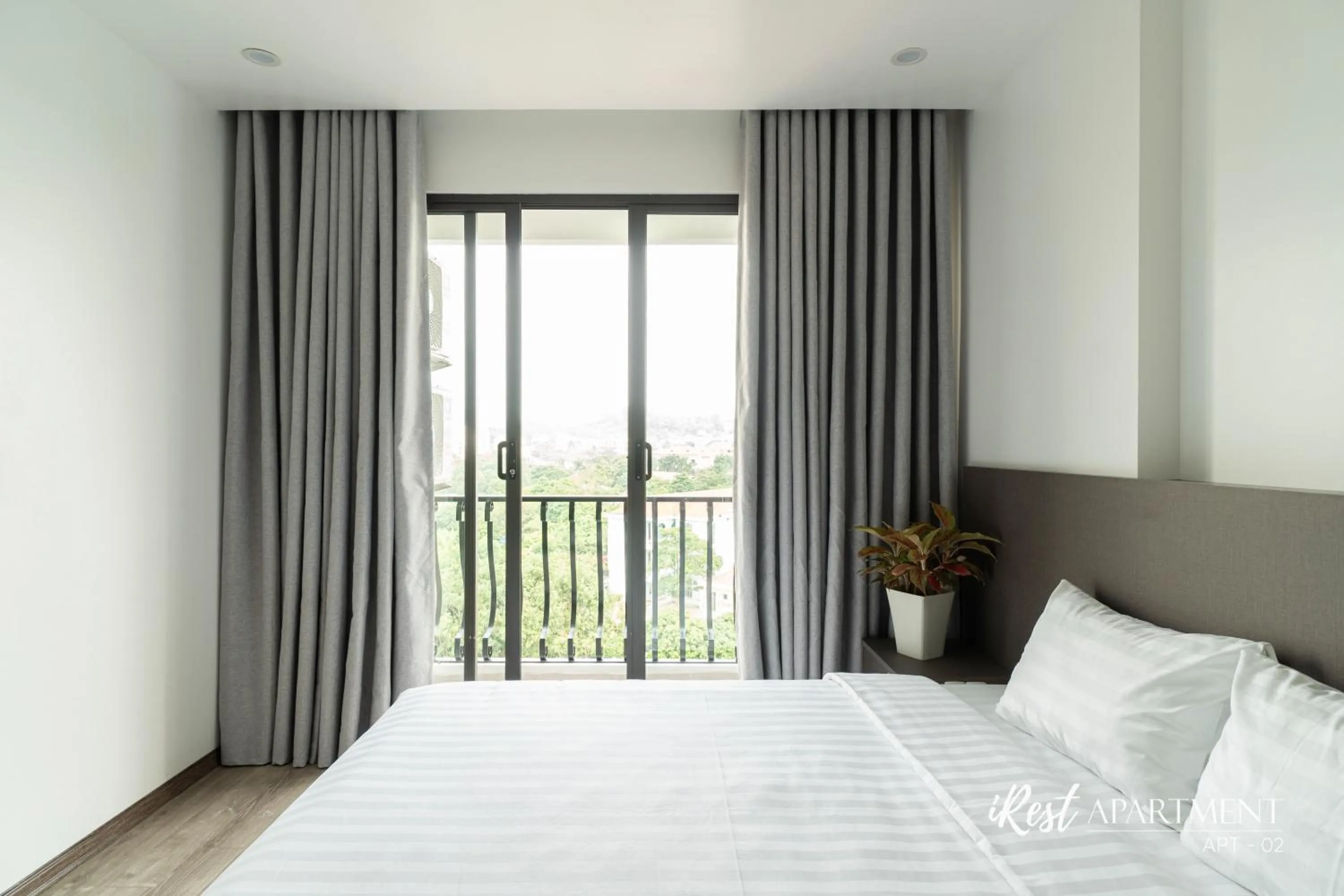 Bed in iRest Apartment Vinh Yen