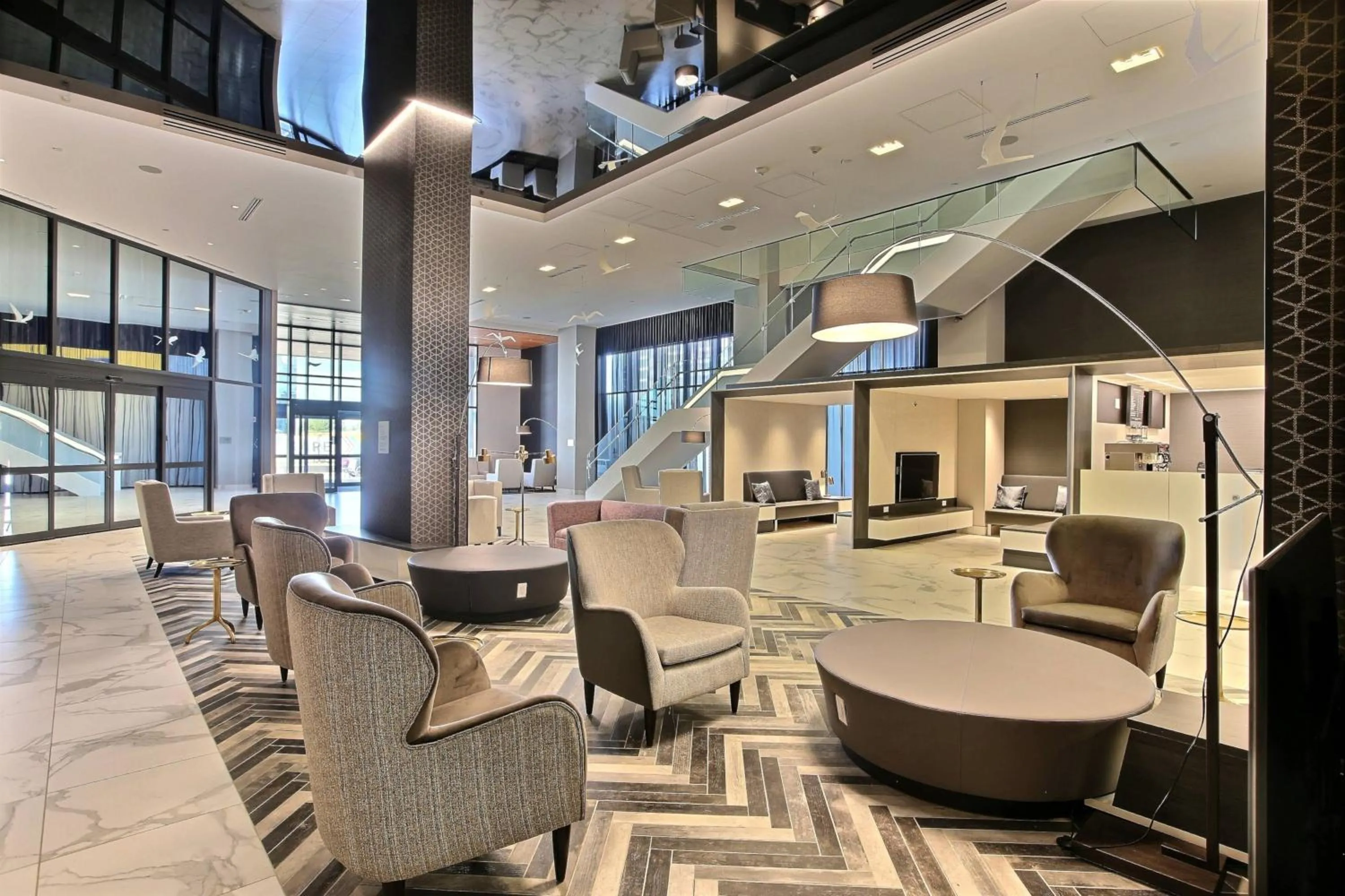 Lobby or reception in Courtyard by Marriott Montreal Brossard