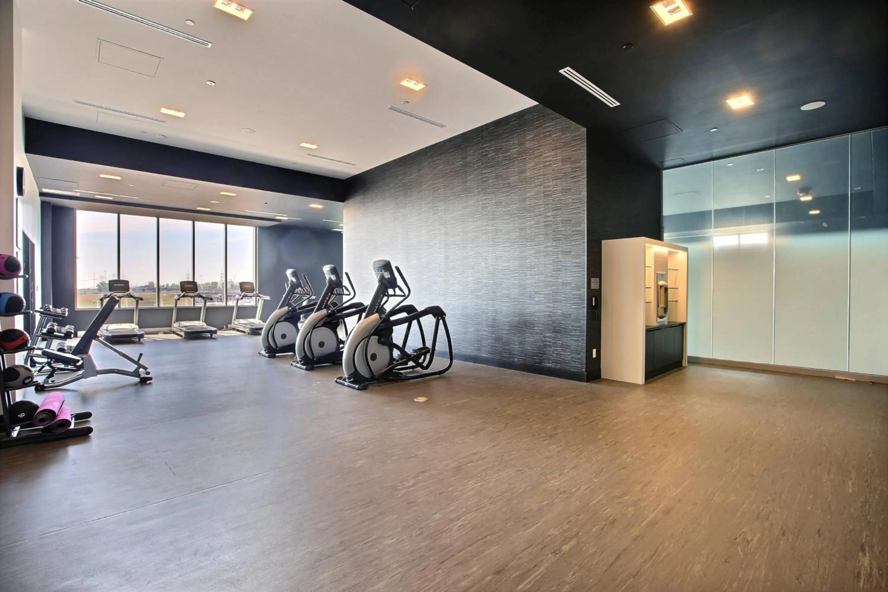 Fitness centre/facilities in Courtyard by Marriott Montreal Brossard