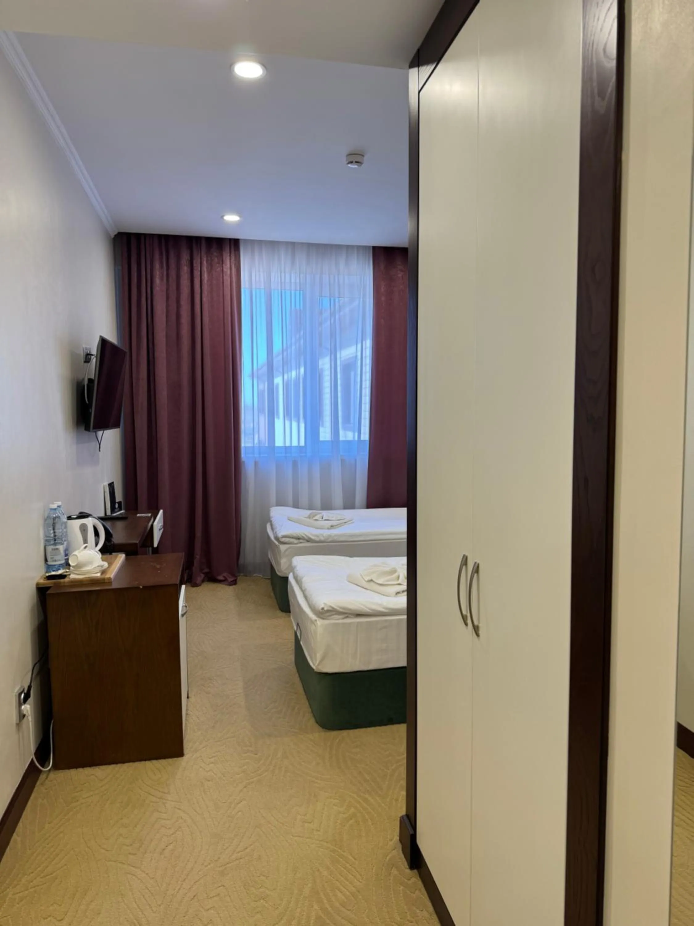 Bed in SULO Atyrau Hotel