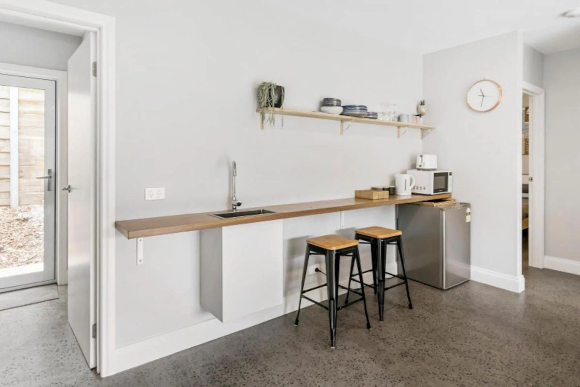 Kitchen or kitchenette in HALE KUPA Rye Beach House Spa Table Tennis