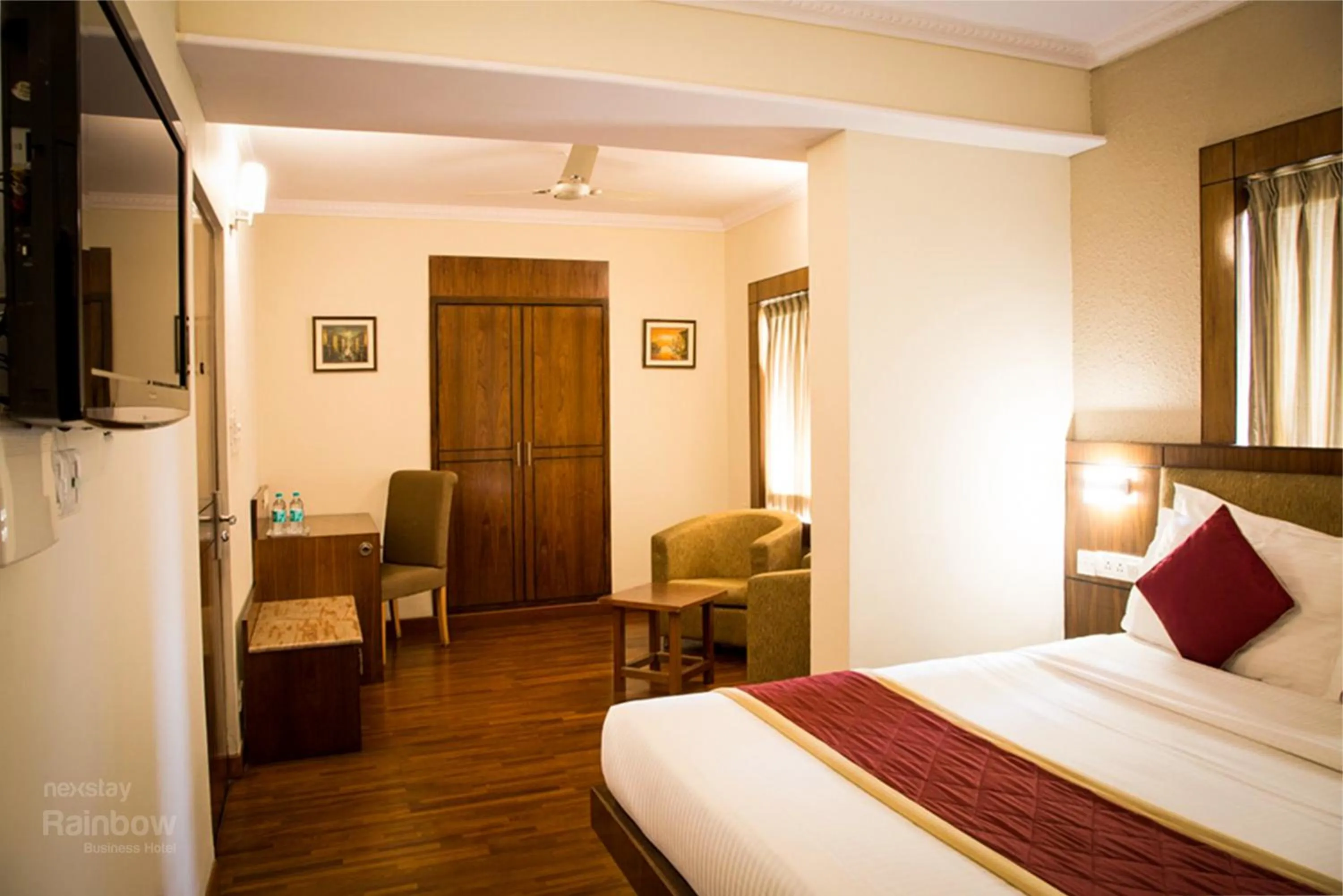 Photo of the whole room, Bed in New Rainbow Business Hotel