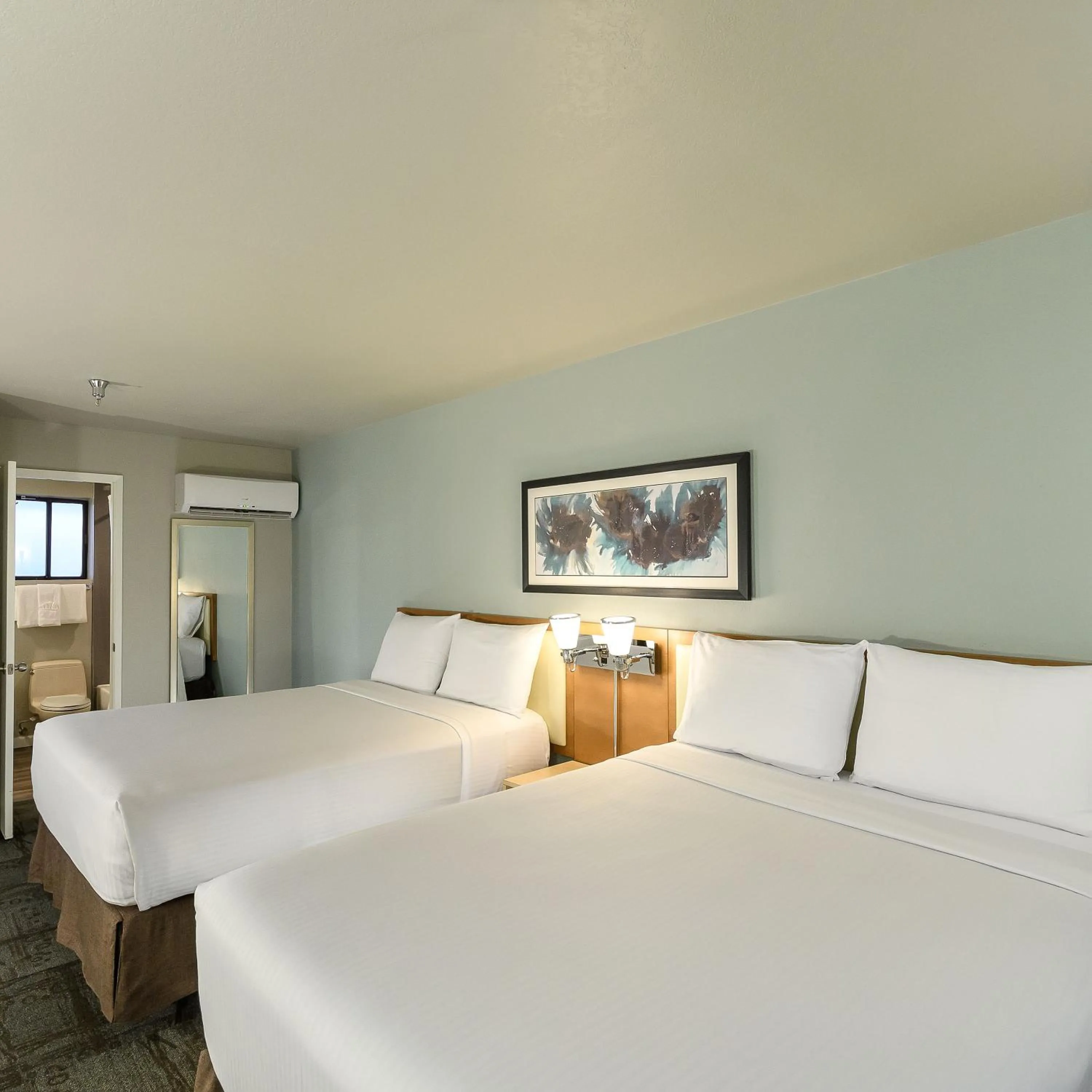 Bed in Alexis Park All Suite Resort