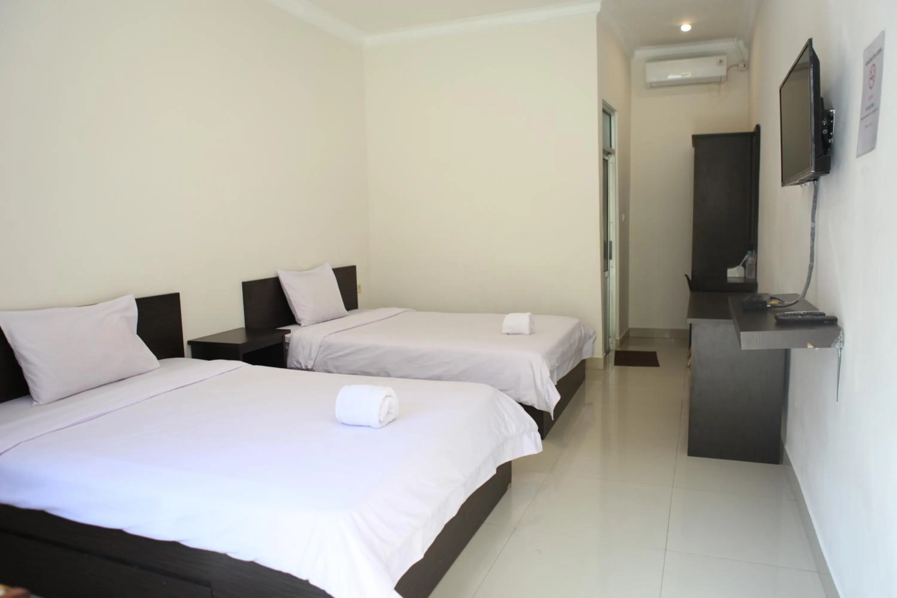 Bed in Rahayu Hotel Cirebon