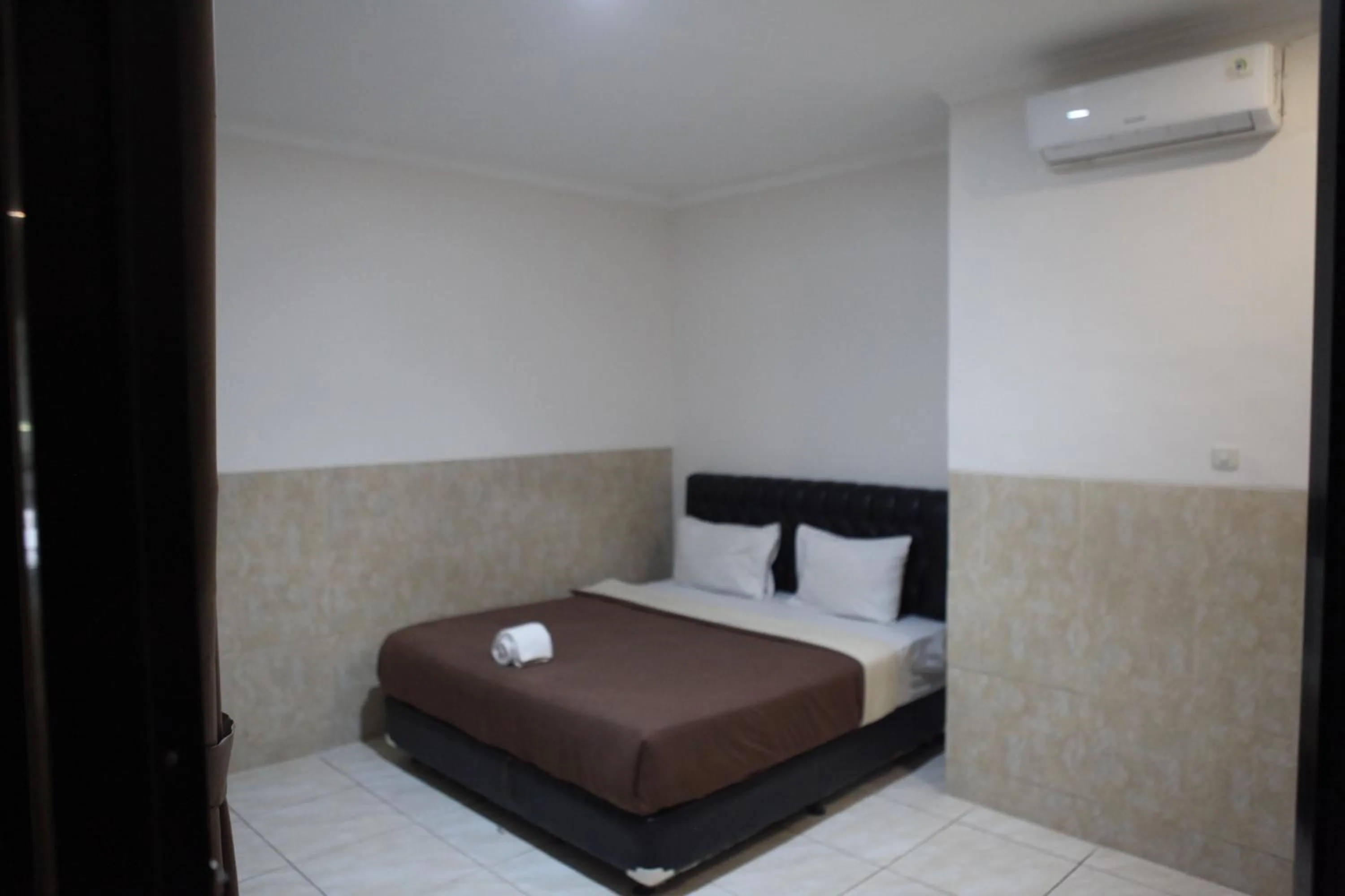 Bed in Rahayu Hotel Cirebon