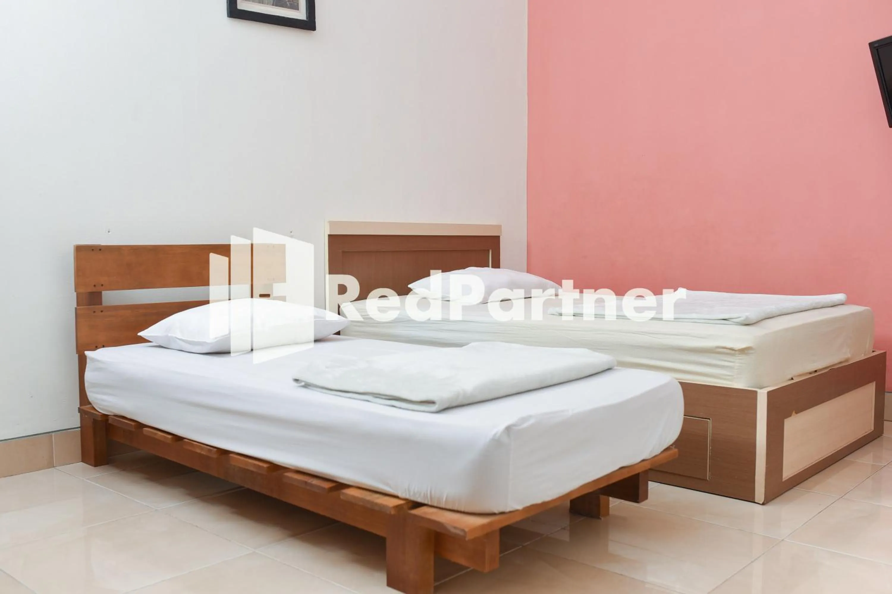 Bed in Homestay Rumah Citra Indah Syariah Mitra RedDoorz