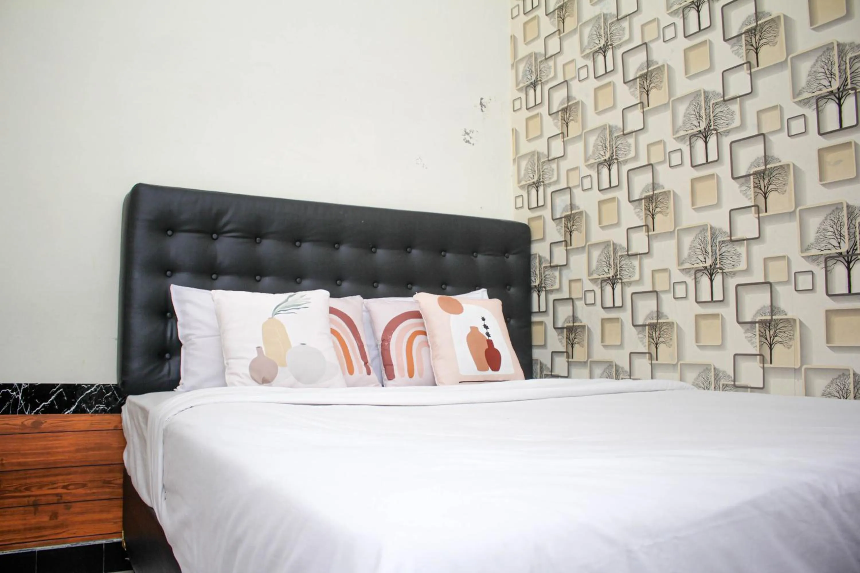 Bedroom, Bed in Capital O 2258 Santana Syariah Guest House