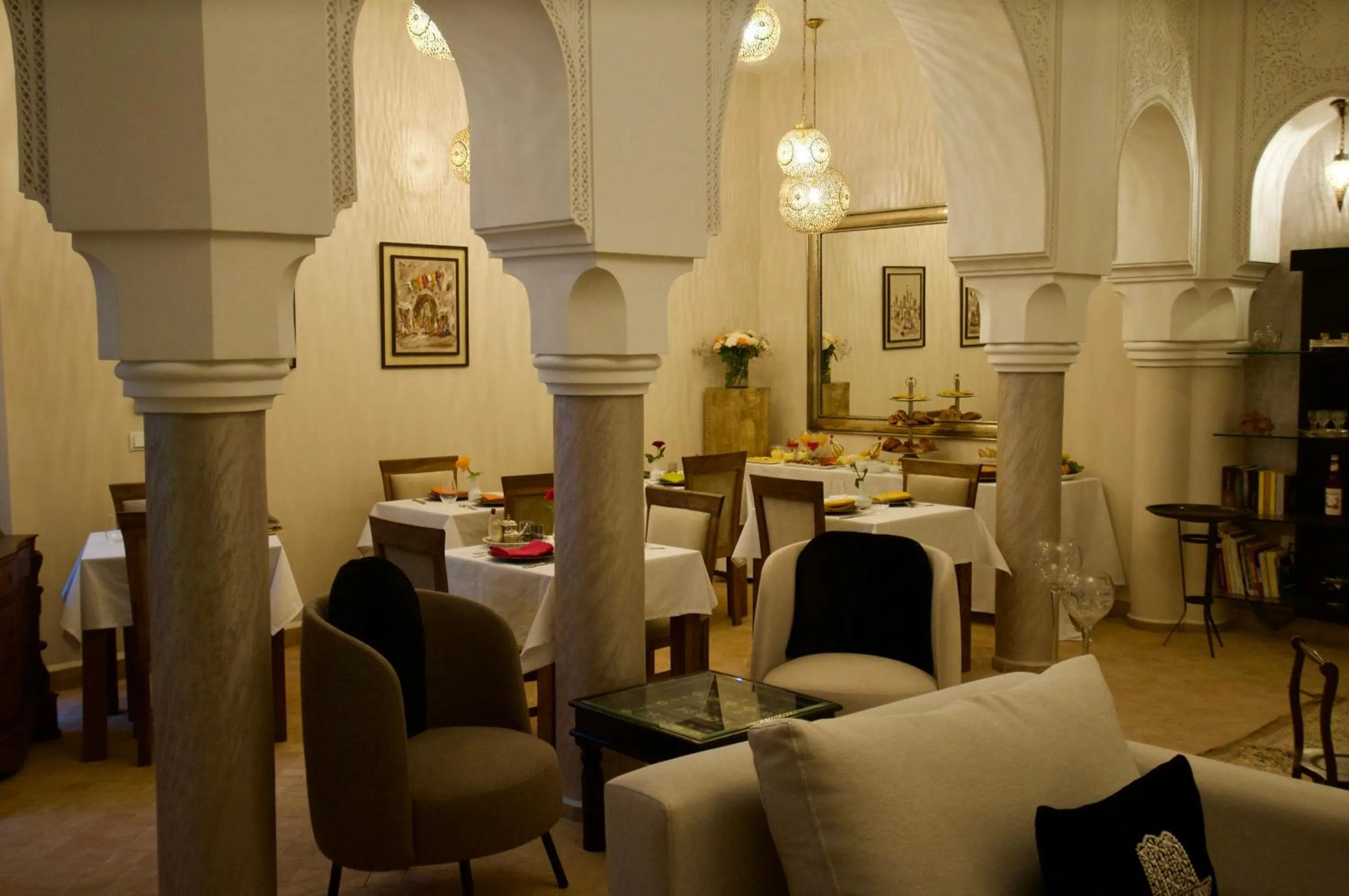 Communal lounge/ TV room in La Claire Fontaine