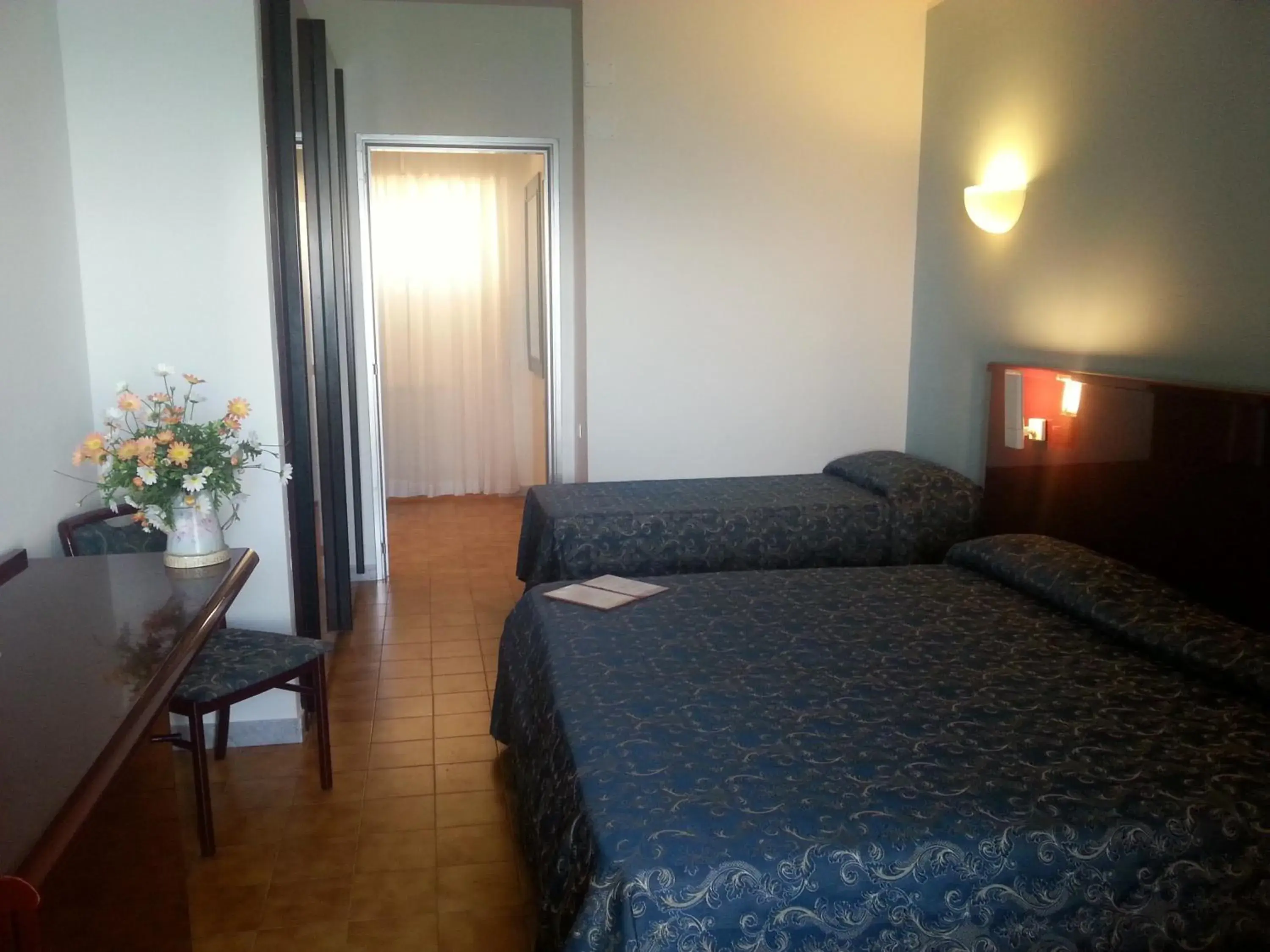 Quadruple Room in Grand Hotel Dei Cesari Dependance Quadruple Room in Grand Hotel Dei Cesari Dependance