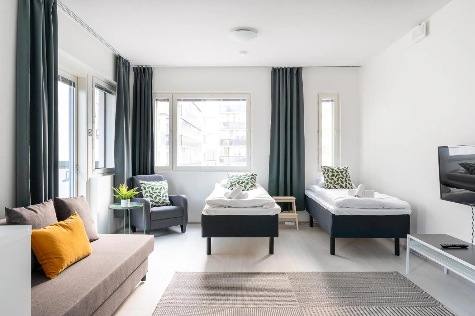 Living room, Bed in Hiisi Homes Vantaa Kaivoksela