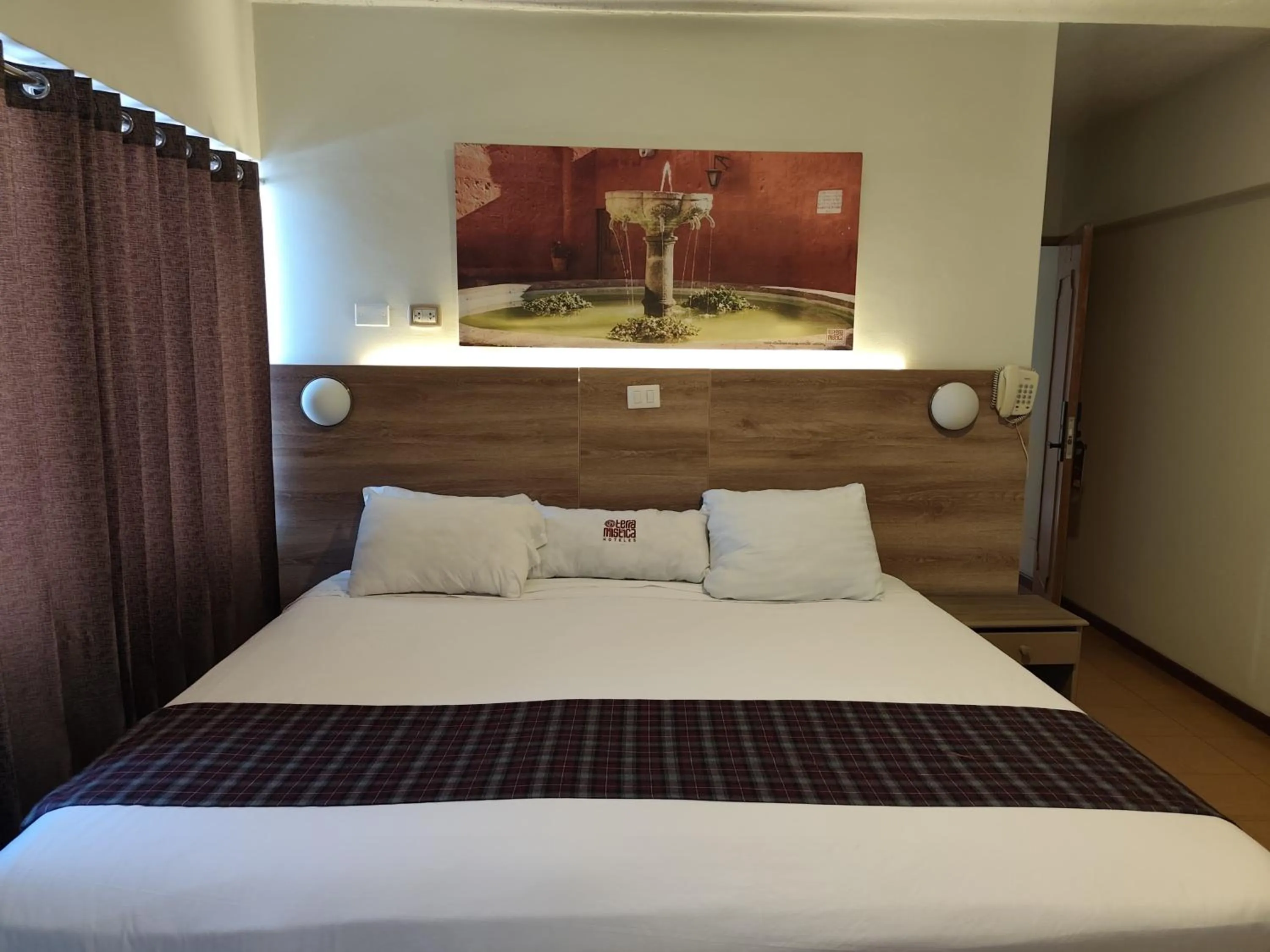 Bed in TERRAMISTICA CENTRO BY Casa Consuelo