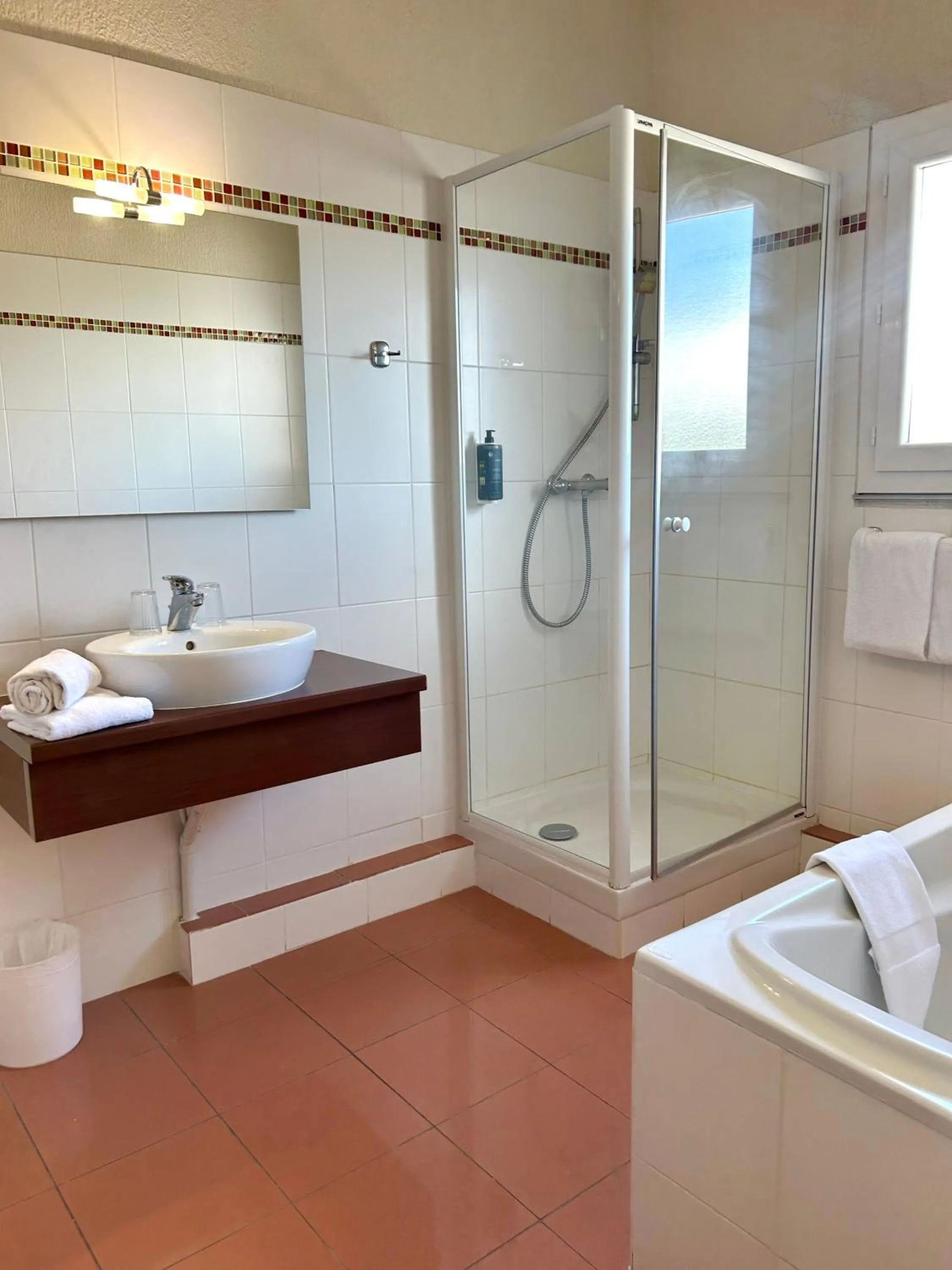 Bathroom in Brit Hotel Opal Centre Port