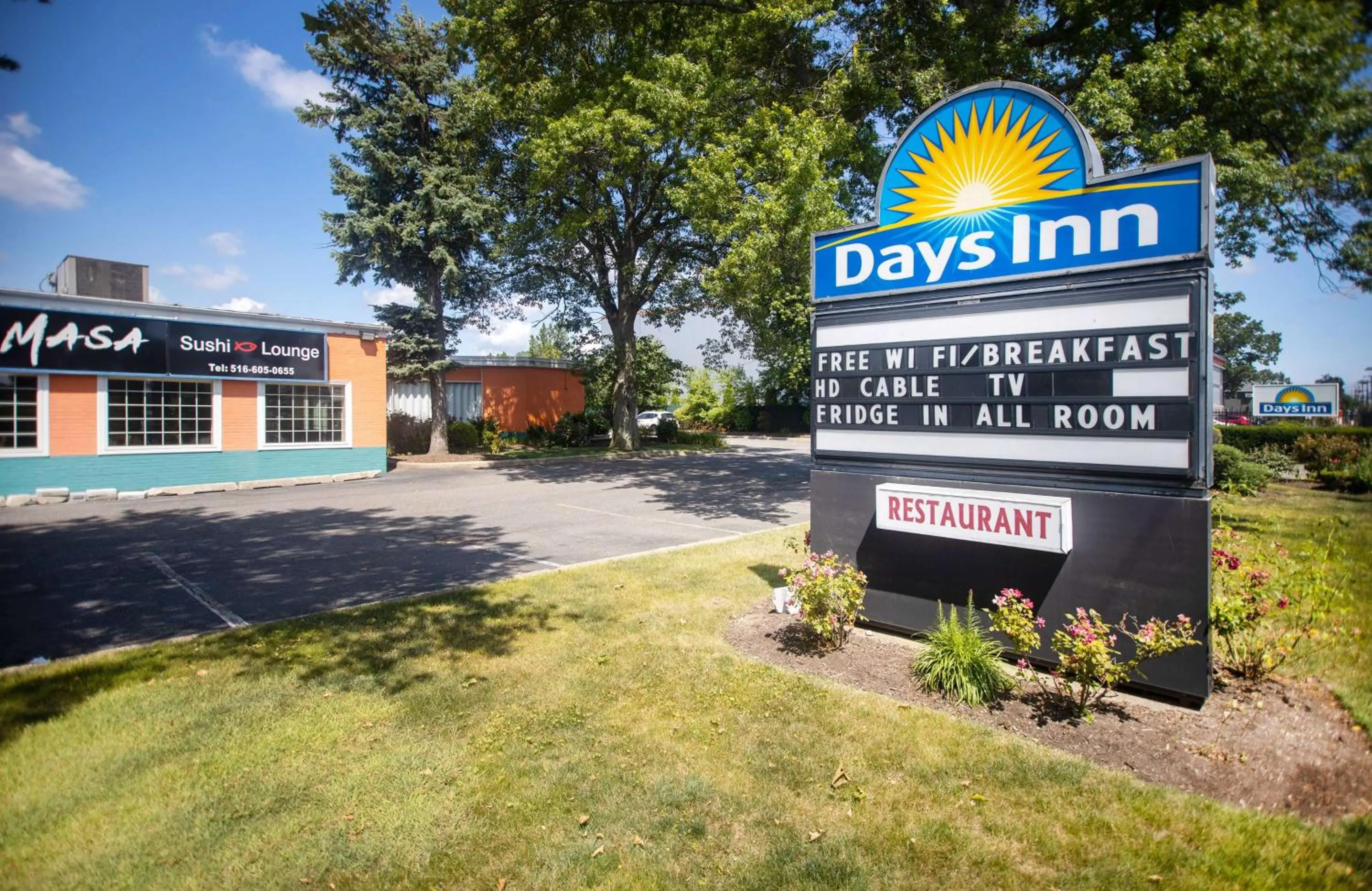 Property building in Days Inn by Wyndham Hicksville Long Island