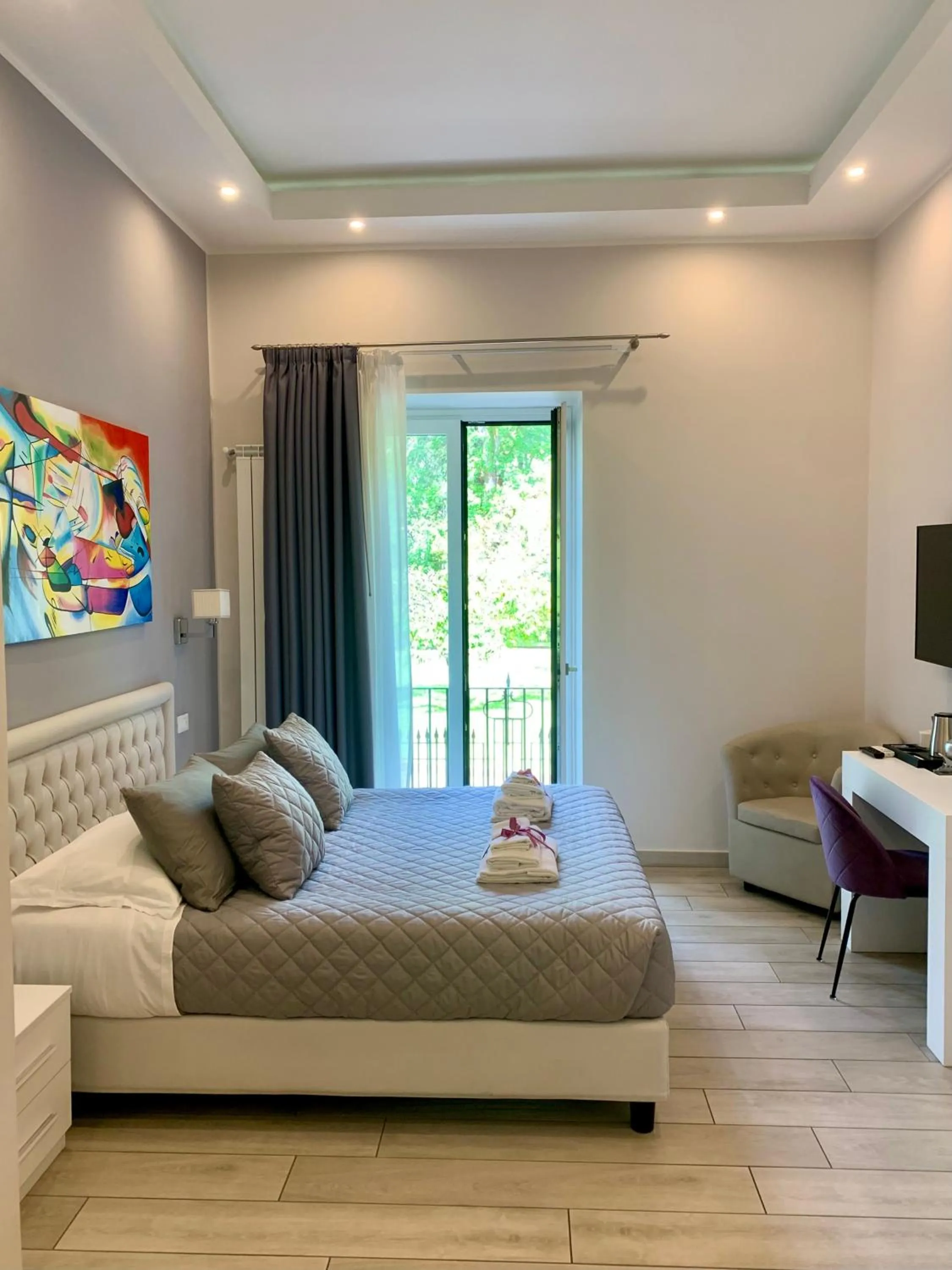 Photo of the whole room, Bed in ROYAL GARDENS