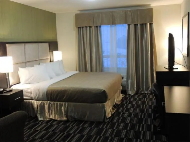 Bed in Western Star Inn and Suites Carlyle