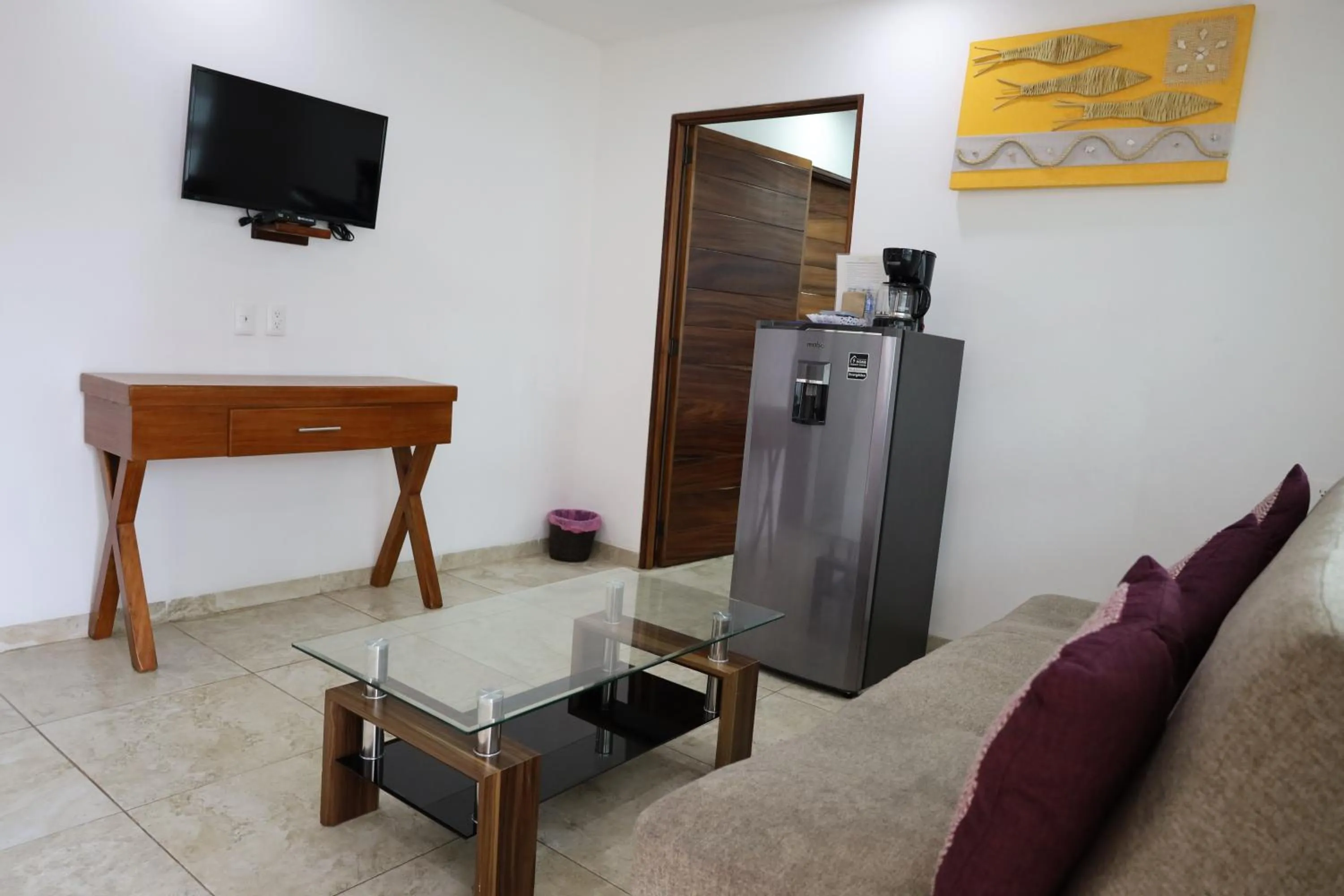 Communal lounge/ TV room in Solez Zihuatanejo