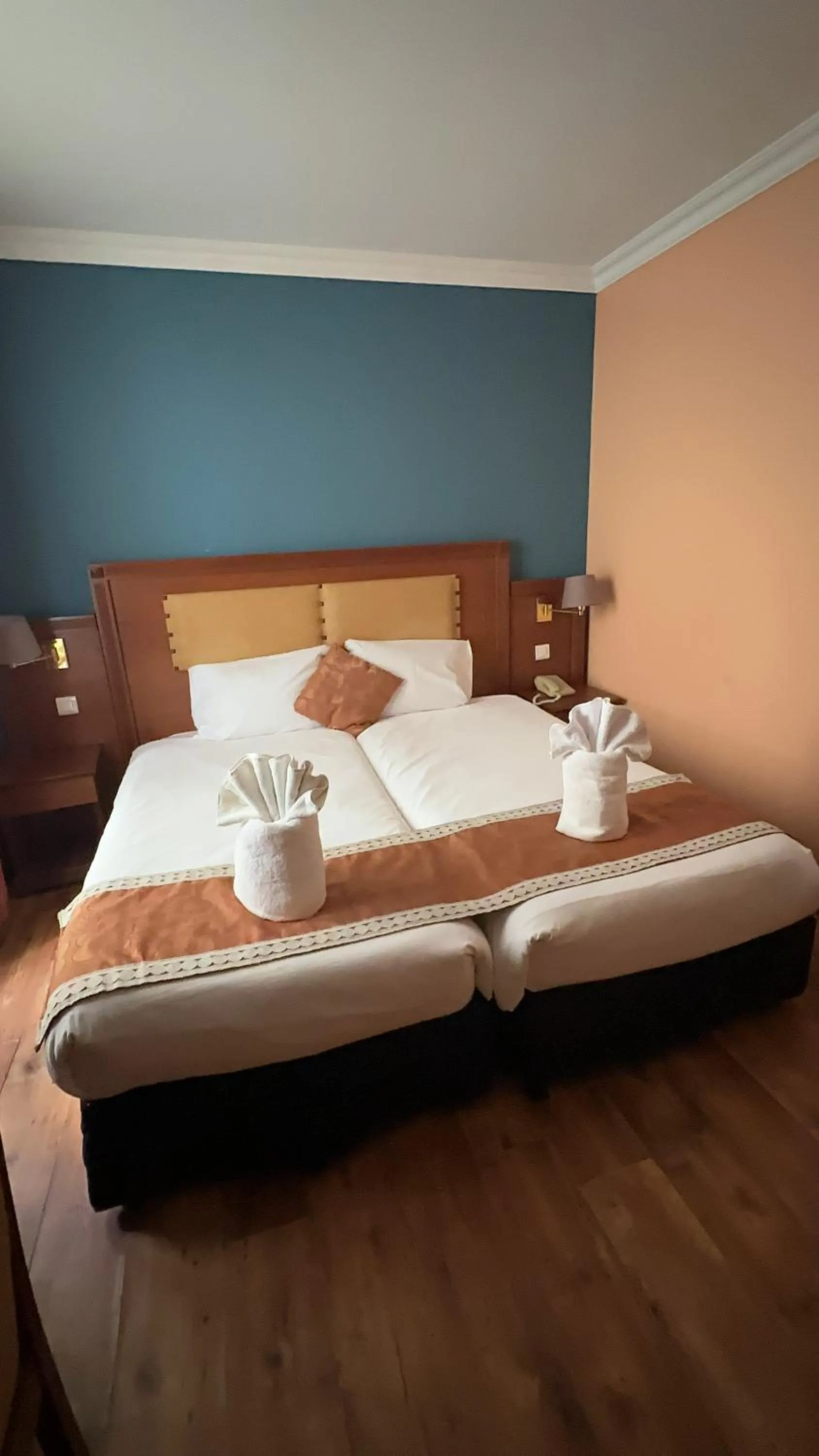 Bed in 121 Paris Hotel