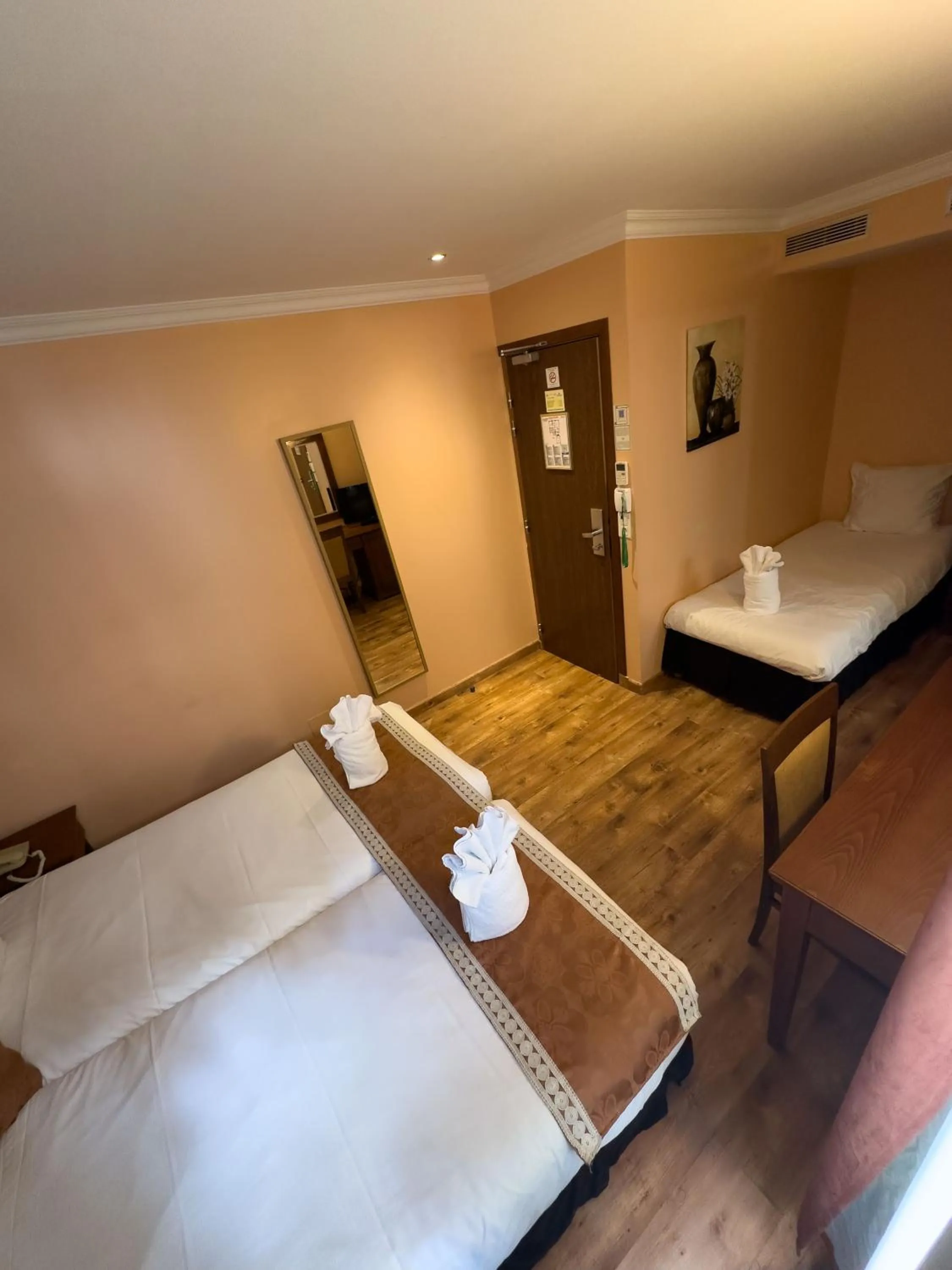 Bed in 121 Paris Hotel