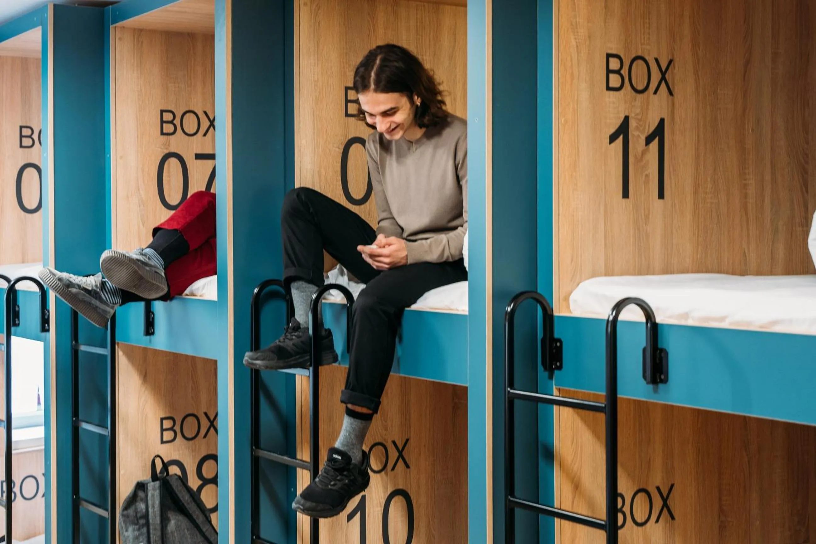 People in Yard Hostel & Coffee