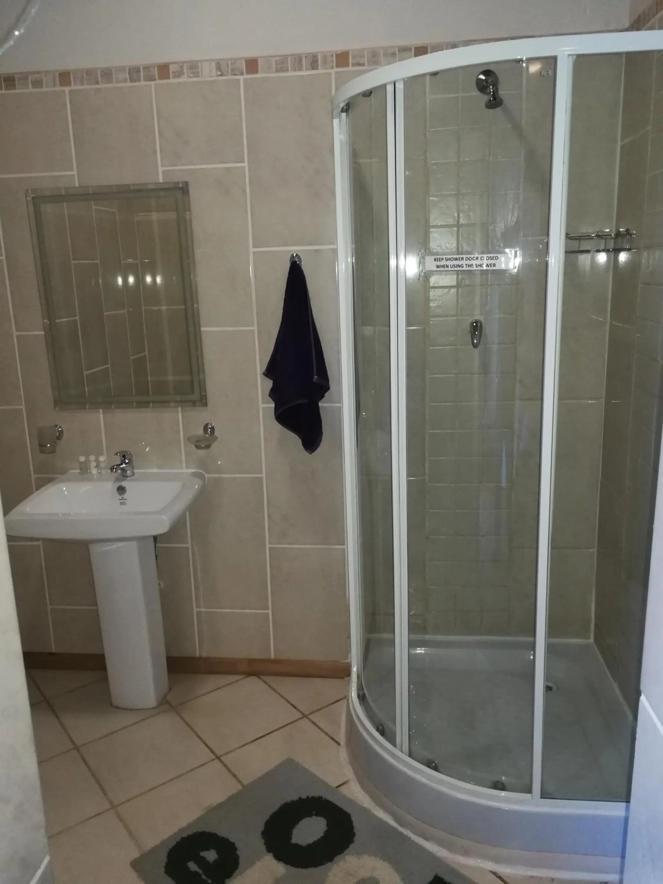 Bathroom in Bougain Villa Guesthouse