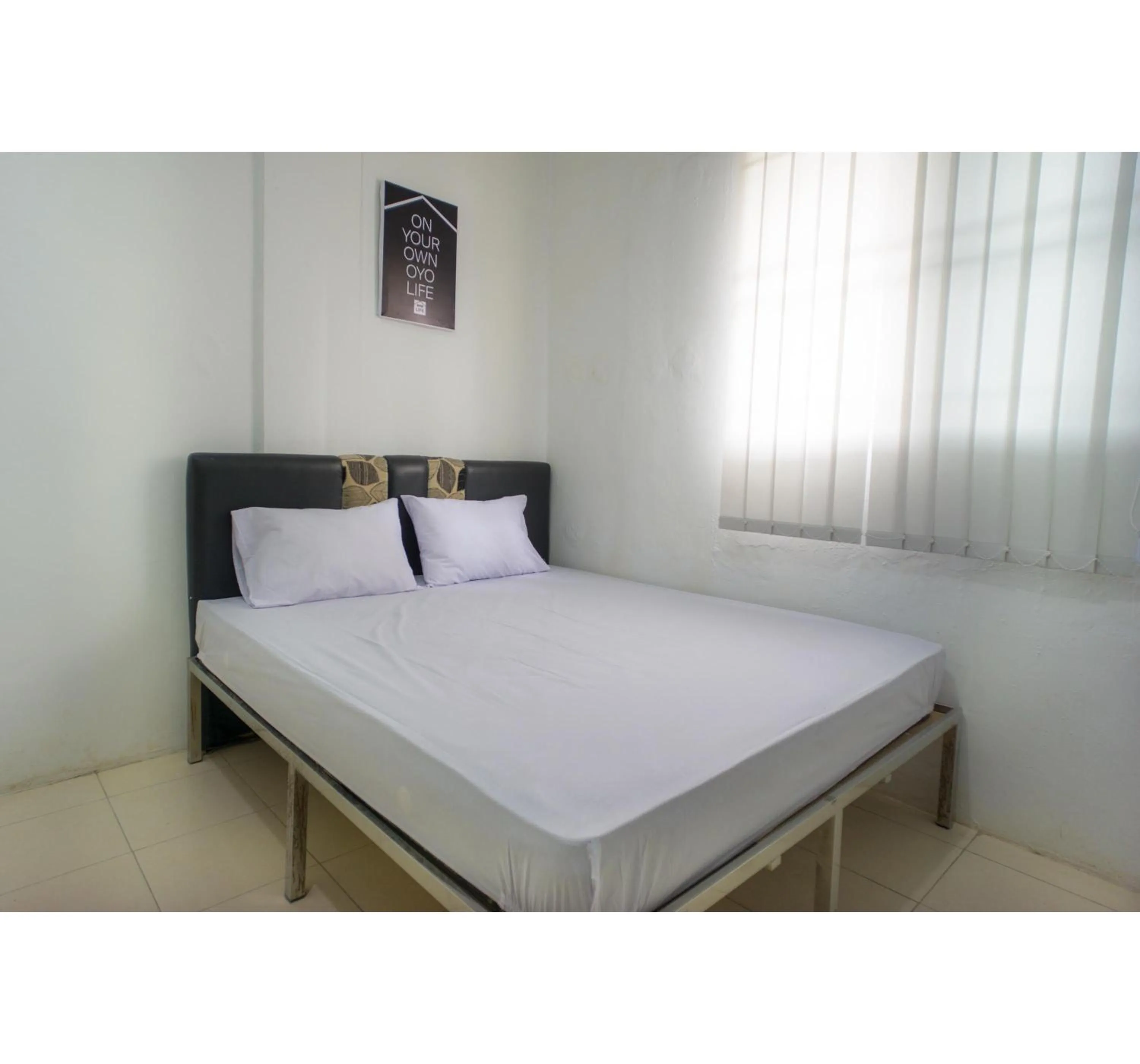 Bedroom, Bed in OYO Life 2366 Gatsu Kost