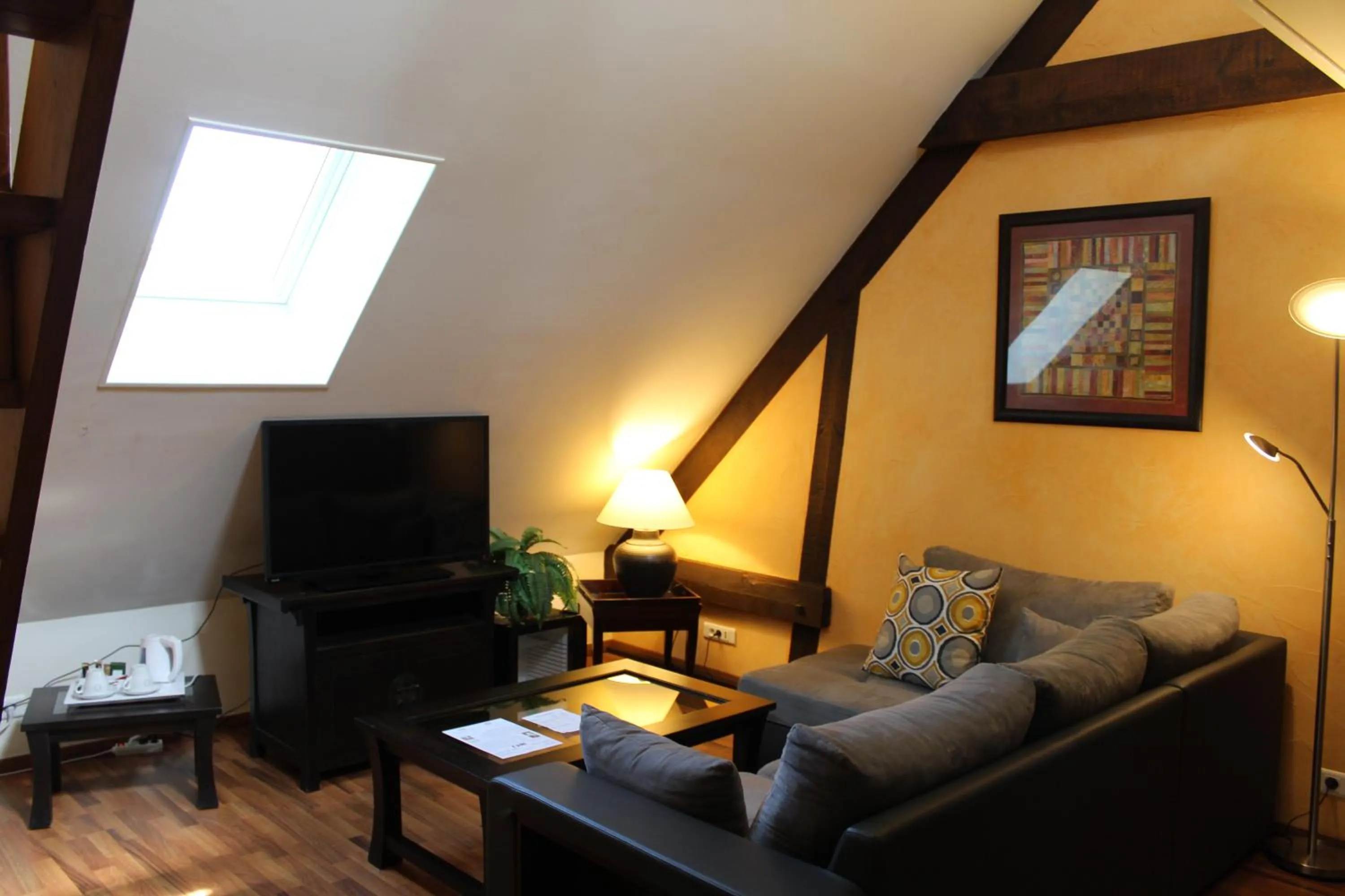 Living room in Logis Hôtel Restaurant Le Quai Fleuri