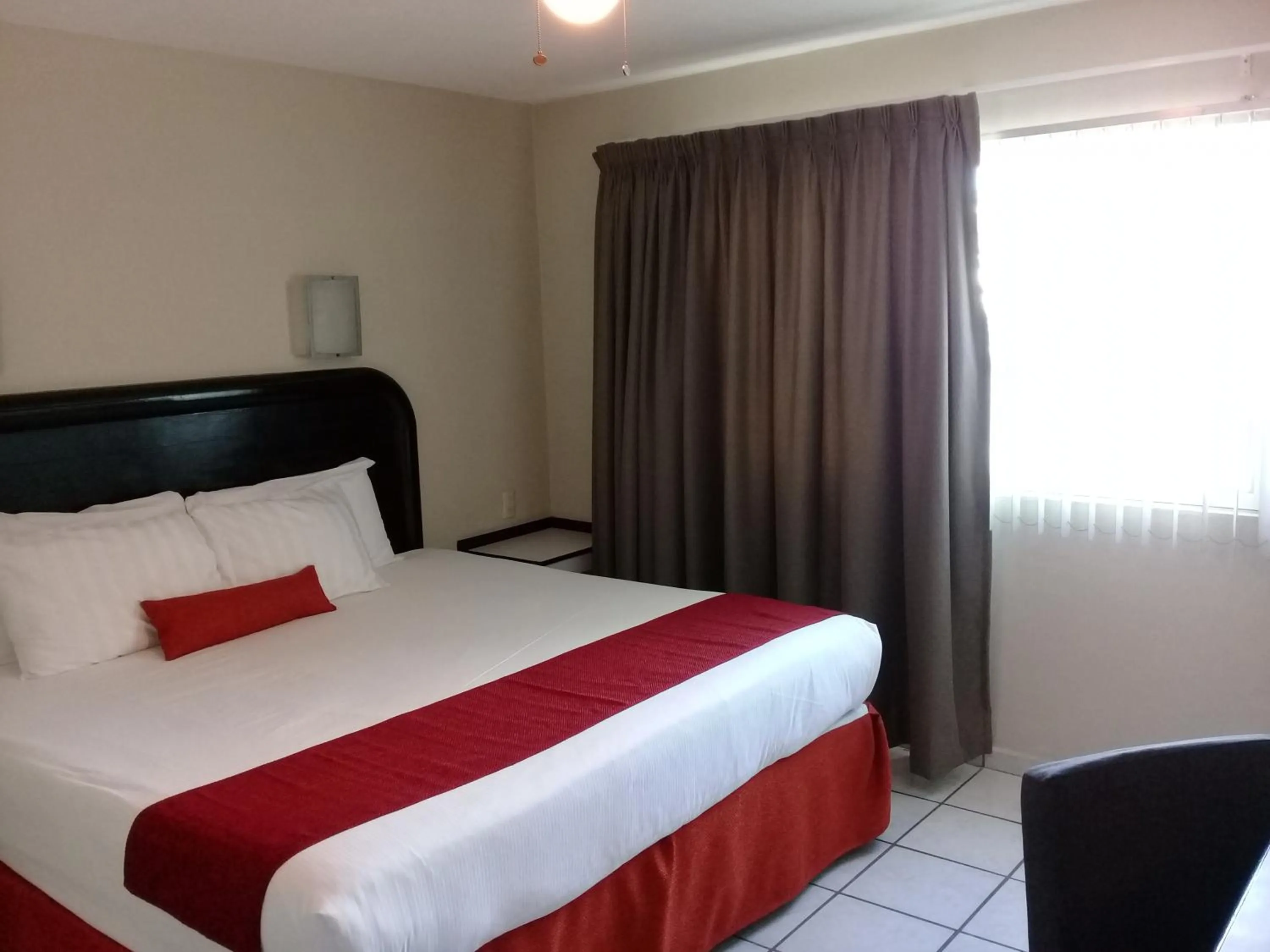 Bed in Howard Johnson by Wyndham Guanajuato Leon Avenida