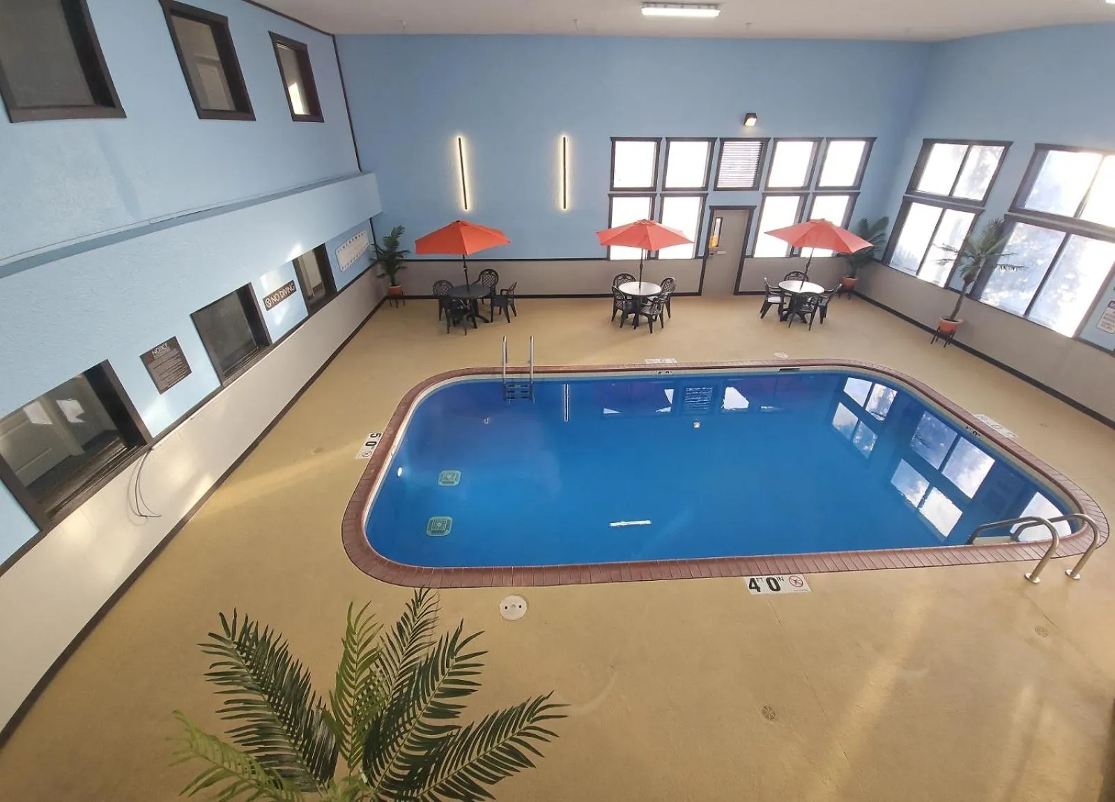 Swimming pool in Riverview Inn & Suites, an Ascend Collection Hotel
