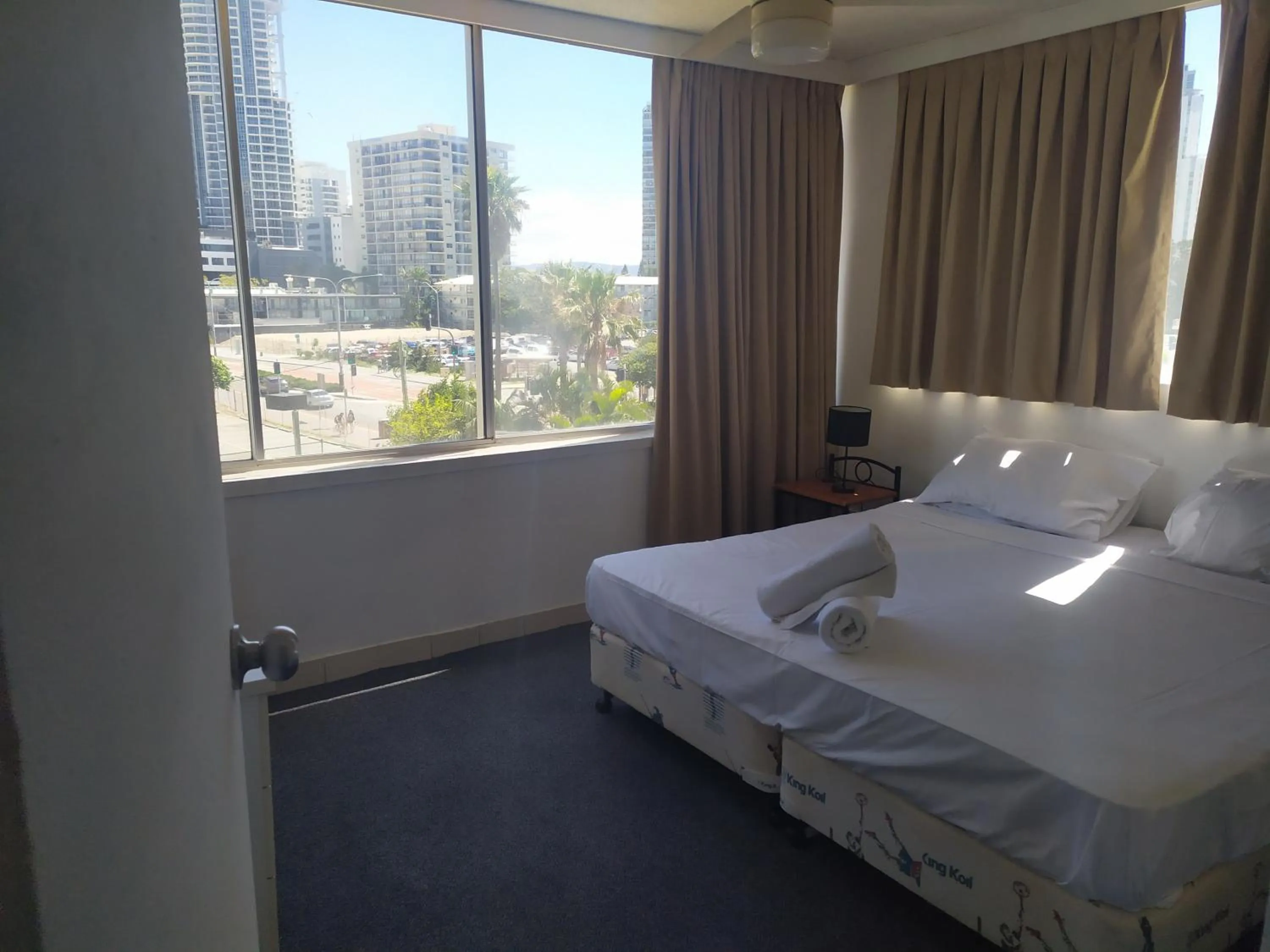 Bed in Quarterdeck Apartments