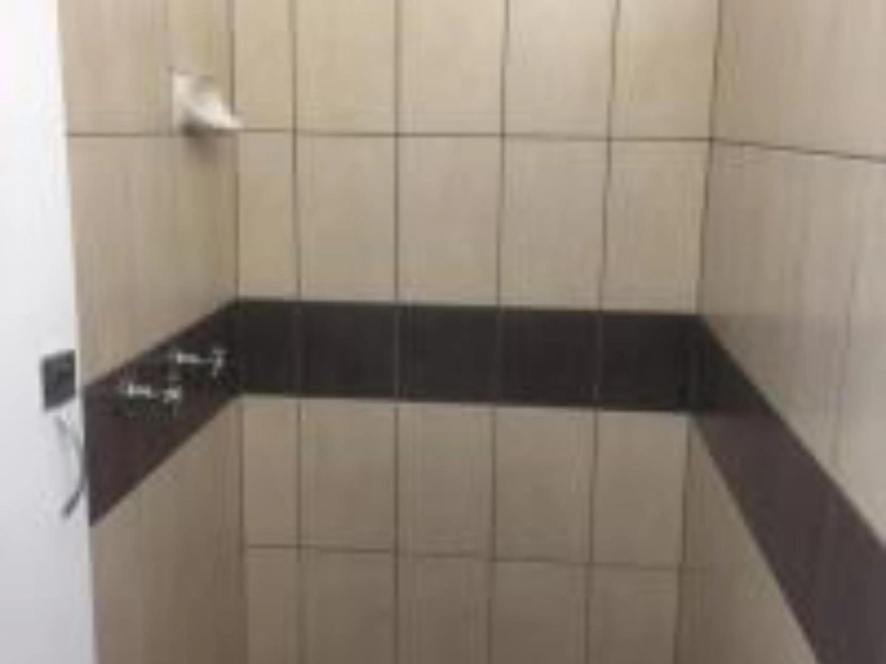 Shower in Paradise Motel