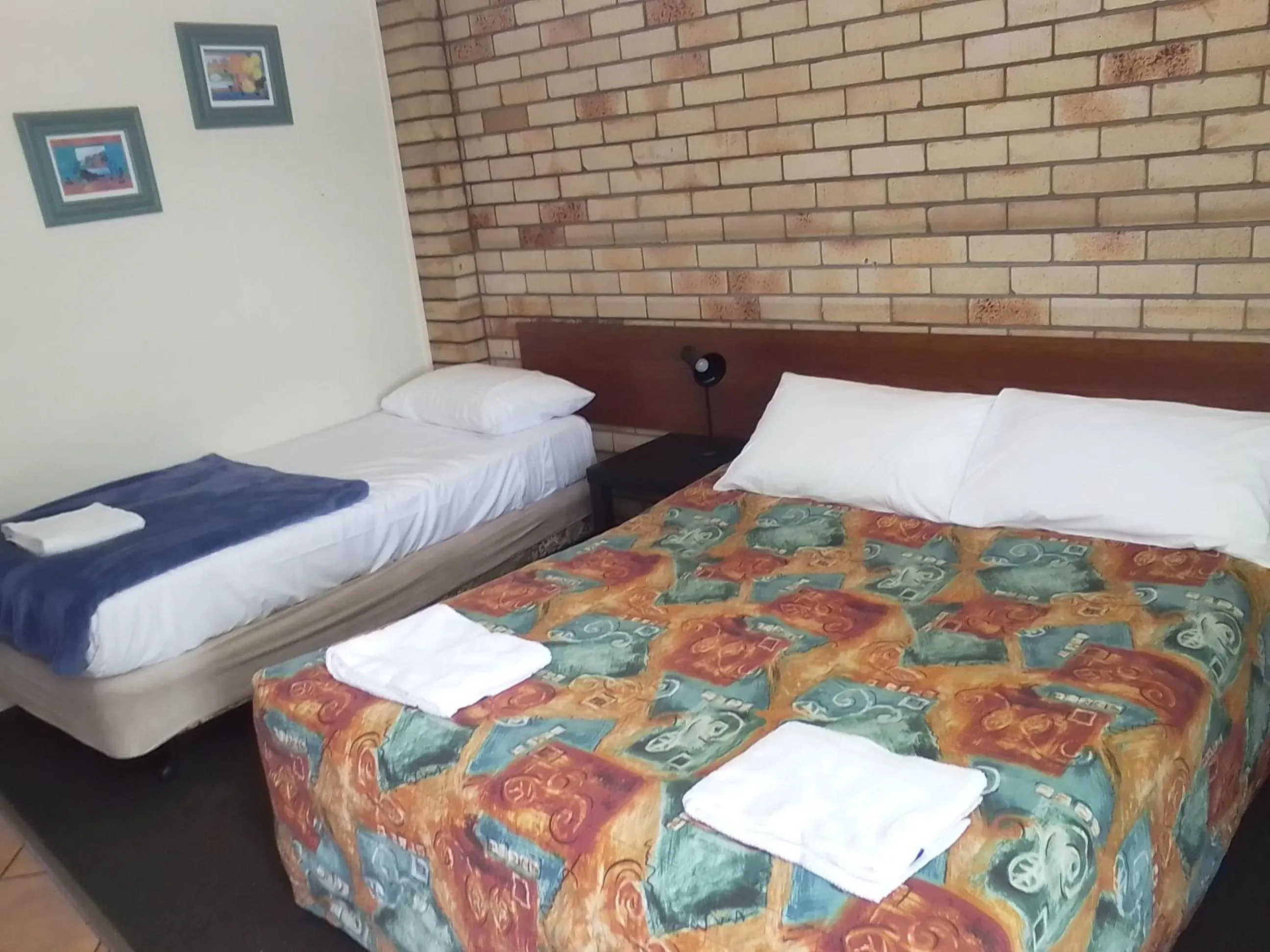 Bed in Paradise Motel