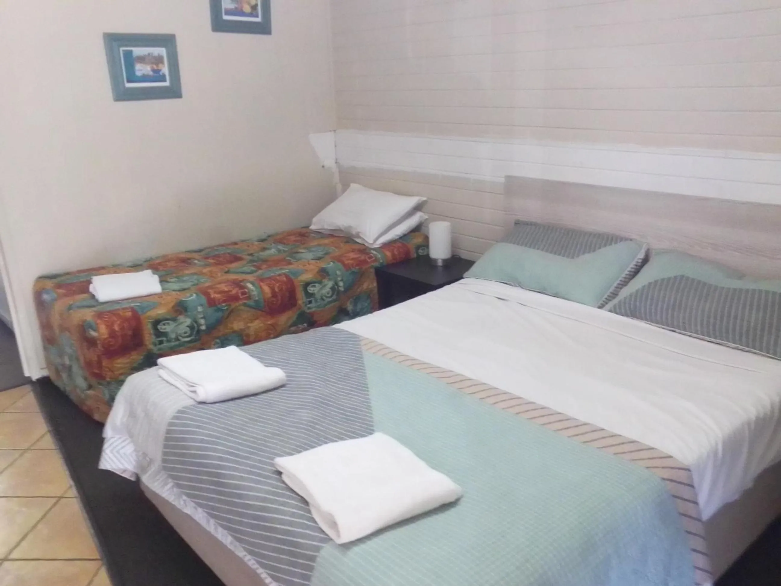 Bed in Paradise Motel