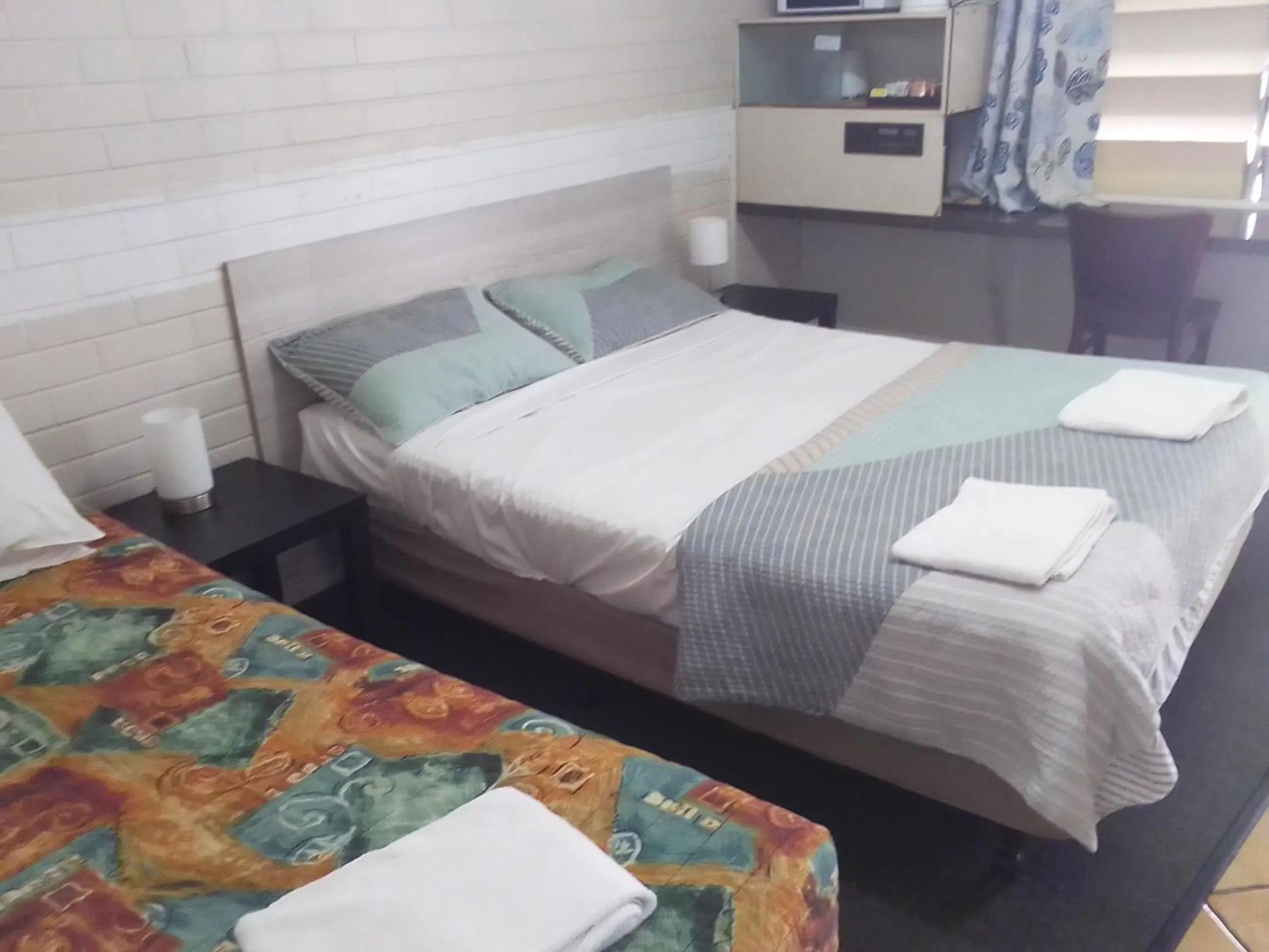 Bed in Paradise Motel