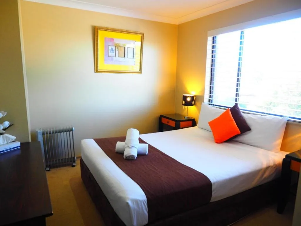 Bed in Bella Vista Motel