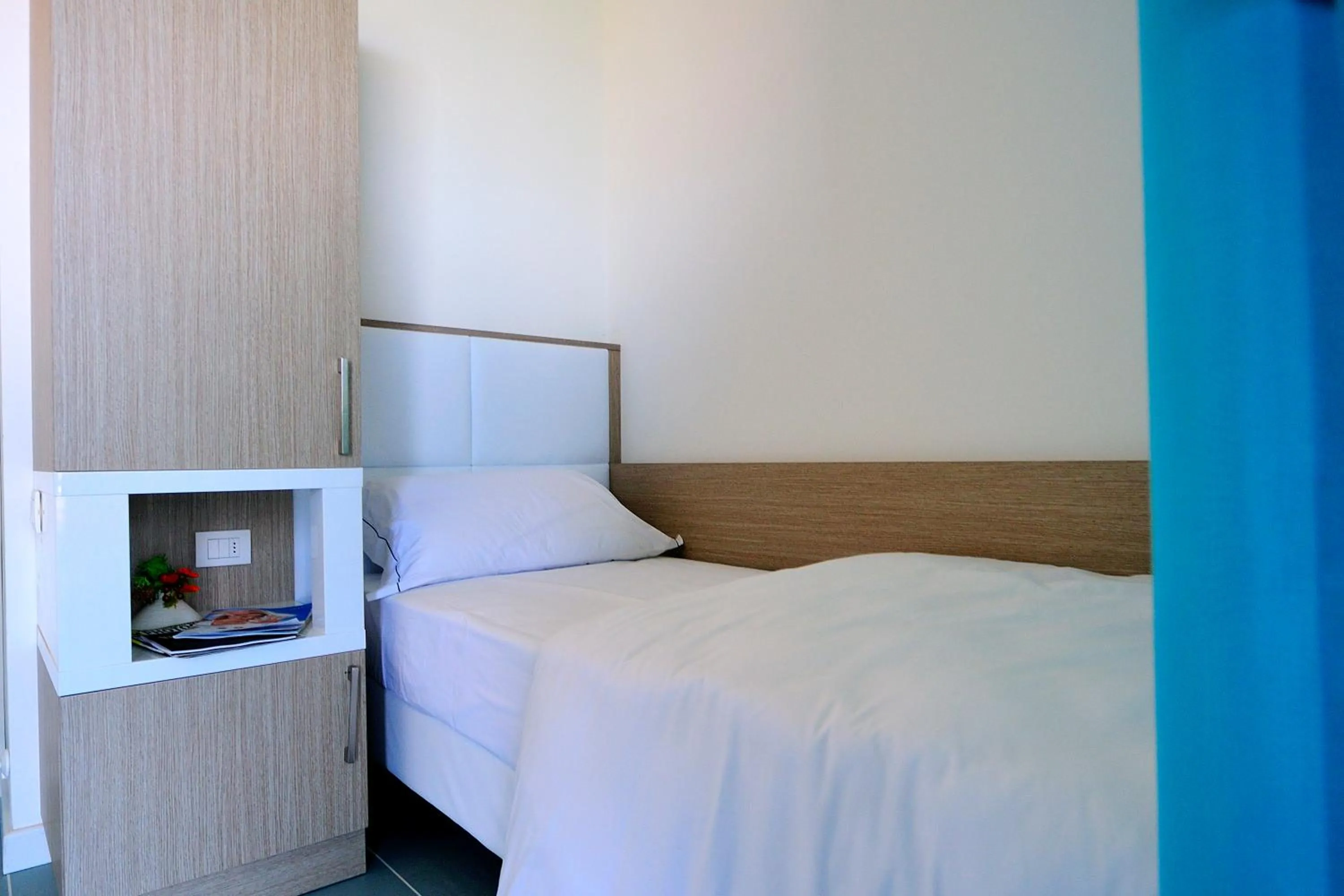 Bed in Aparthotel Tiziano